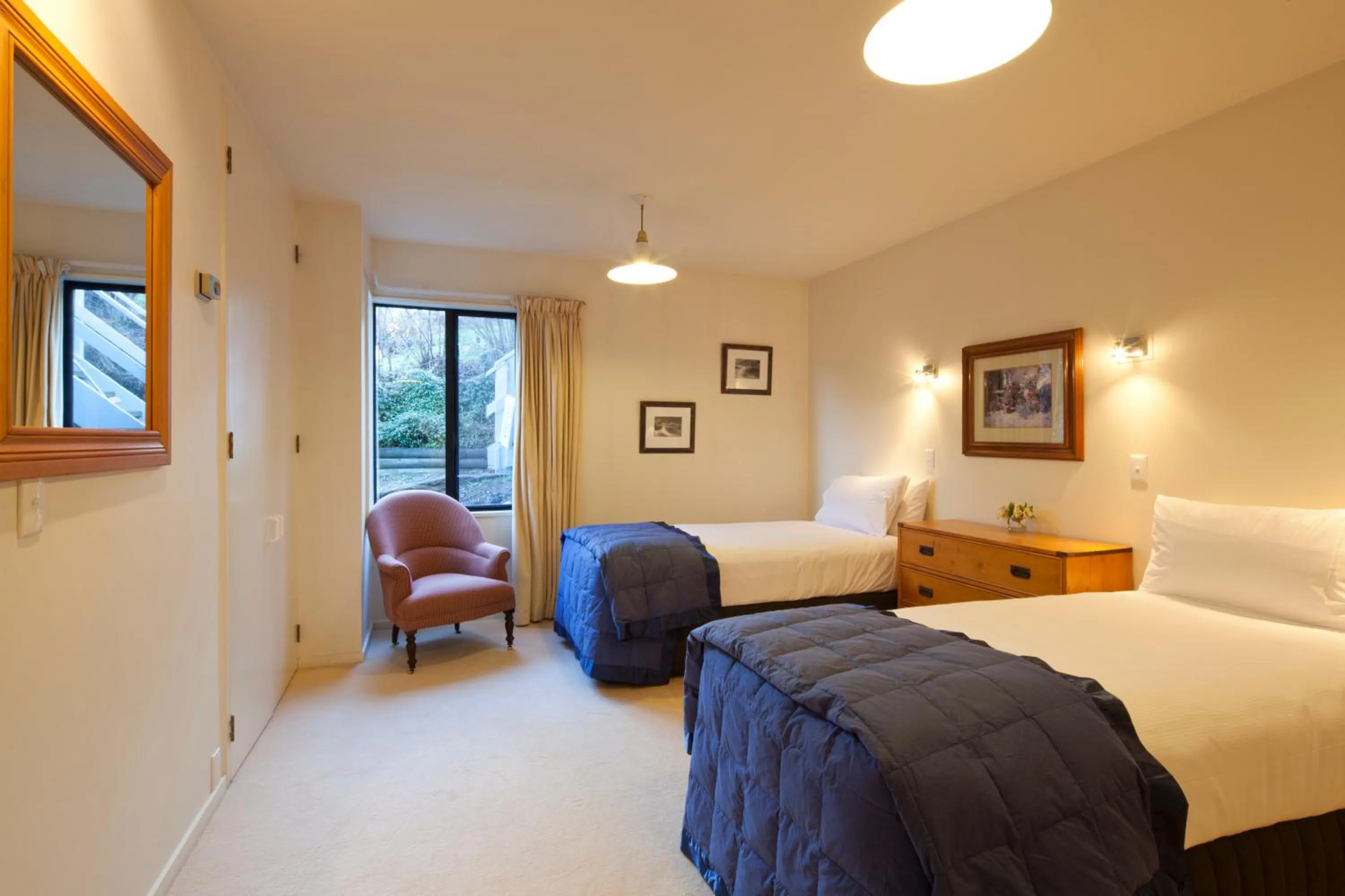 Bed in Spinnaker Bay Apartments