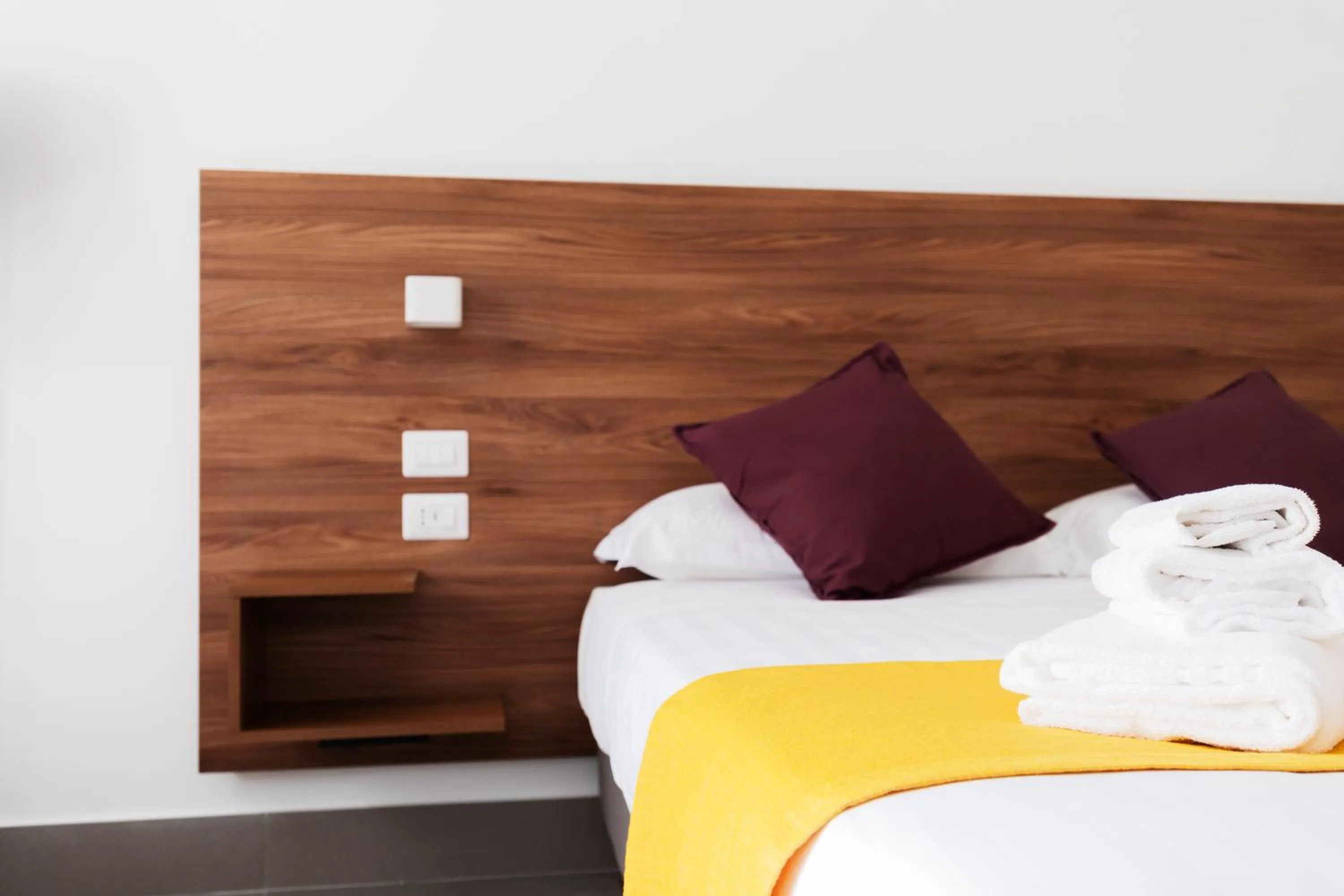 Bed in Acate81 Lifestyle Apartment