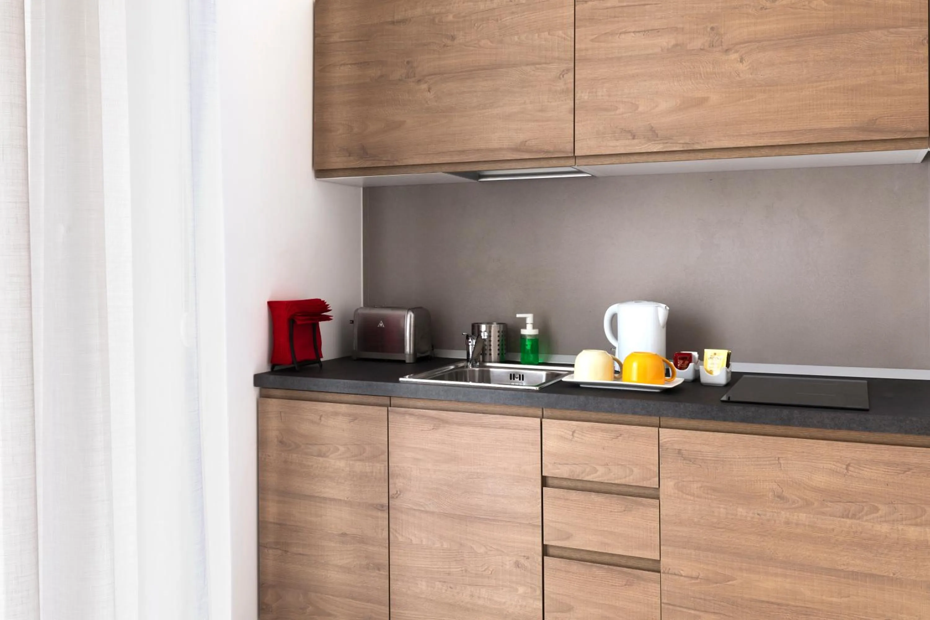 Coffee/tea facilities in Acate81 Lifestyle Apartment