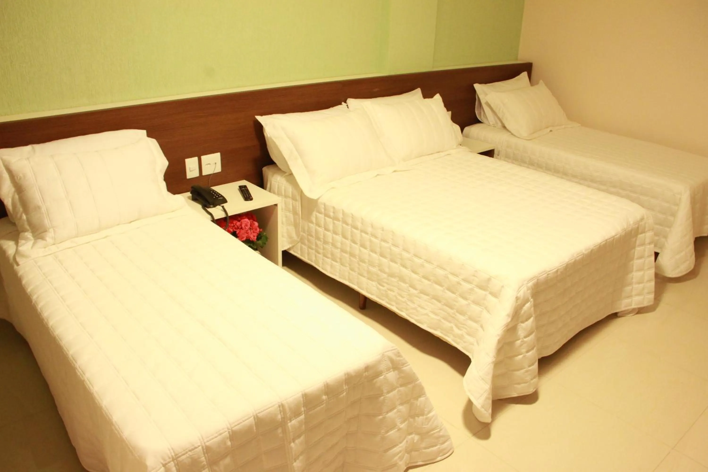 Bed in Hotel Saron
