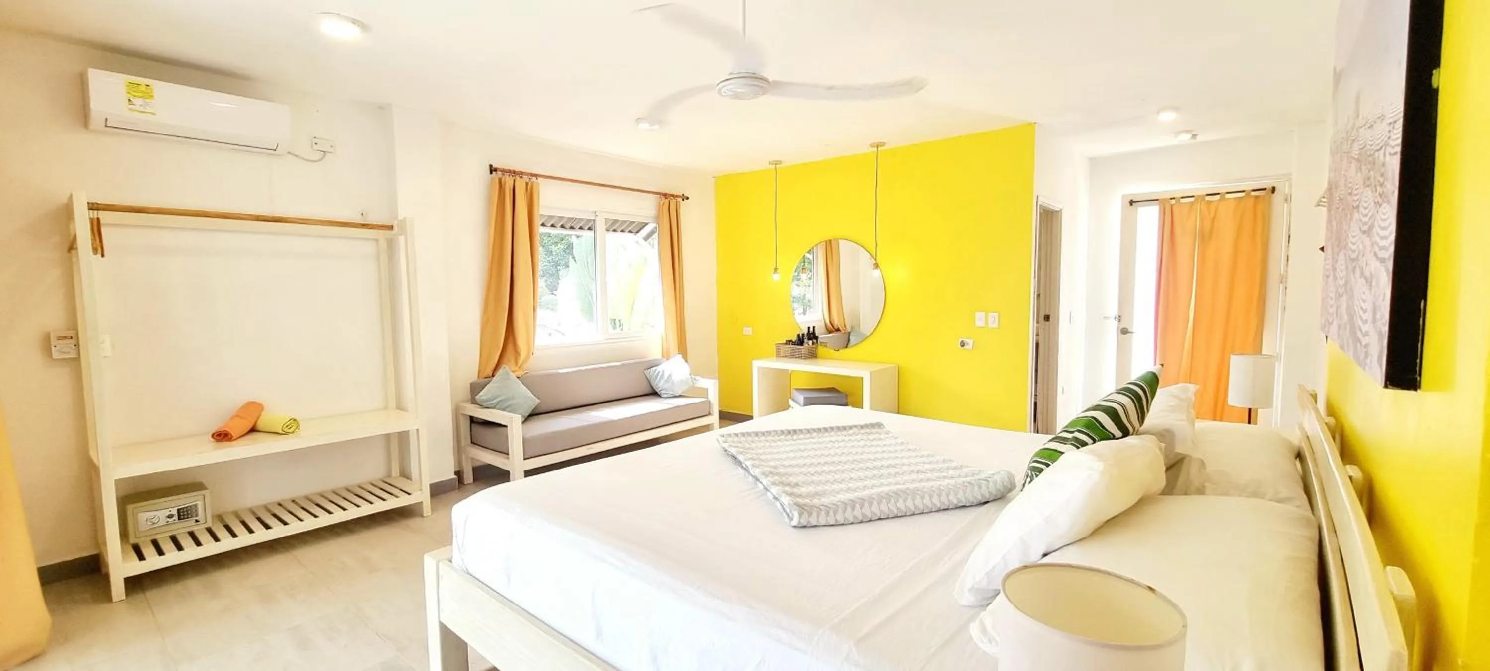 Bed in Blue Mango Beach Hotel