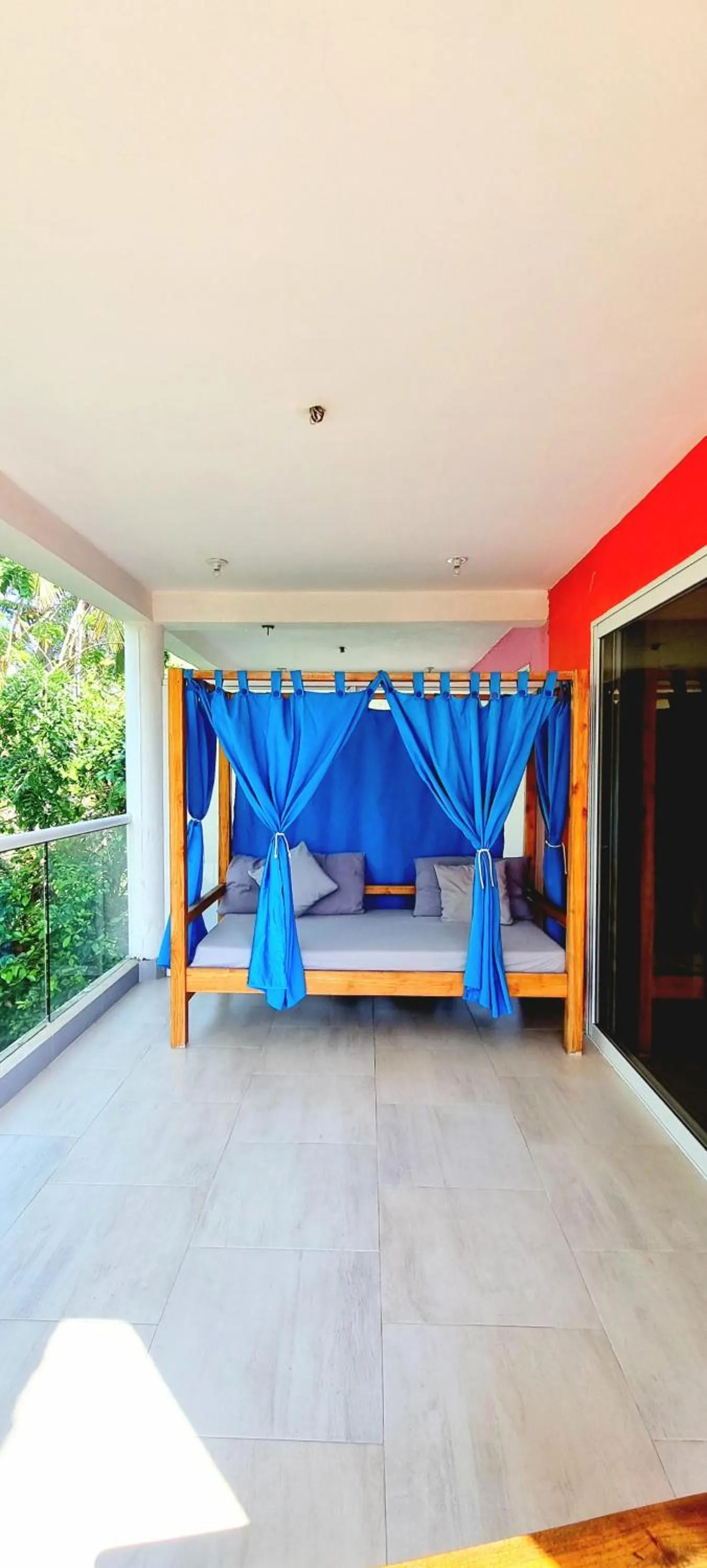Patio, Bed in Blue Mango Beach Hotel