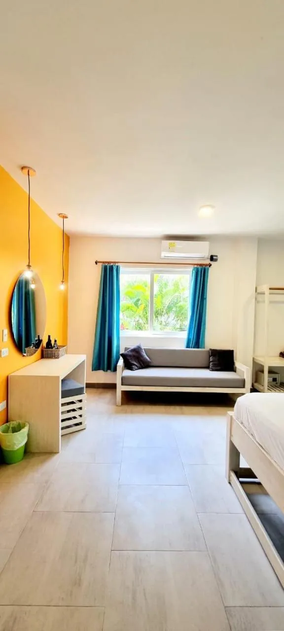 Bed in Blue Mango Beach Hotel