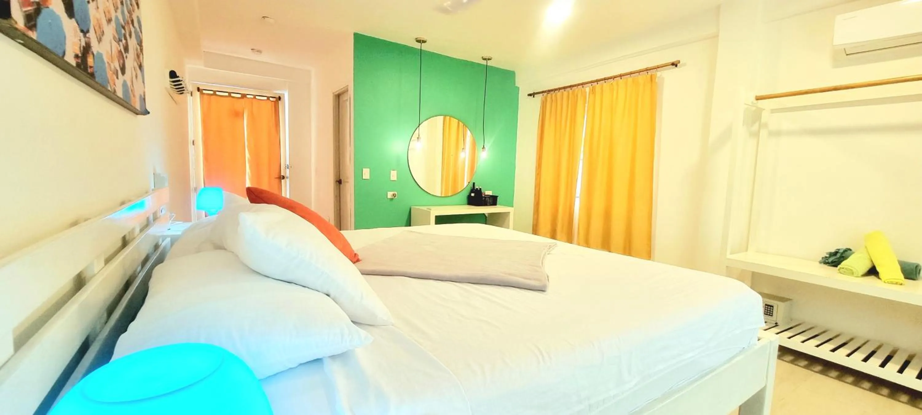 Bed in Blue Mango Beach Hotel