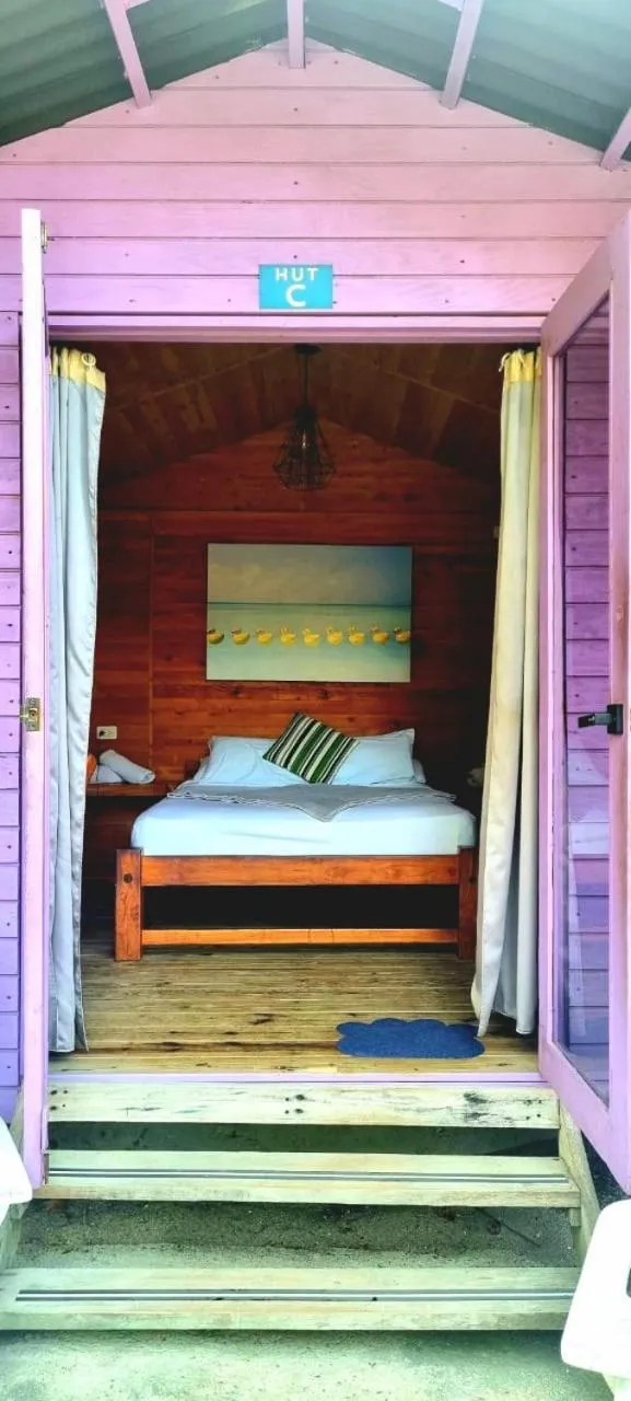 Bed in Blue Mango Beach Hotel