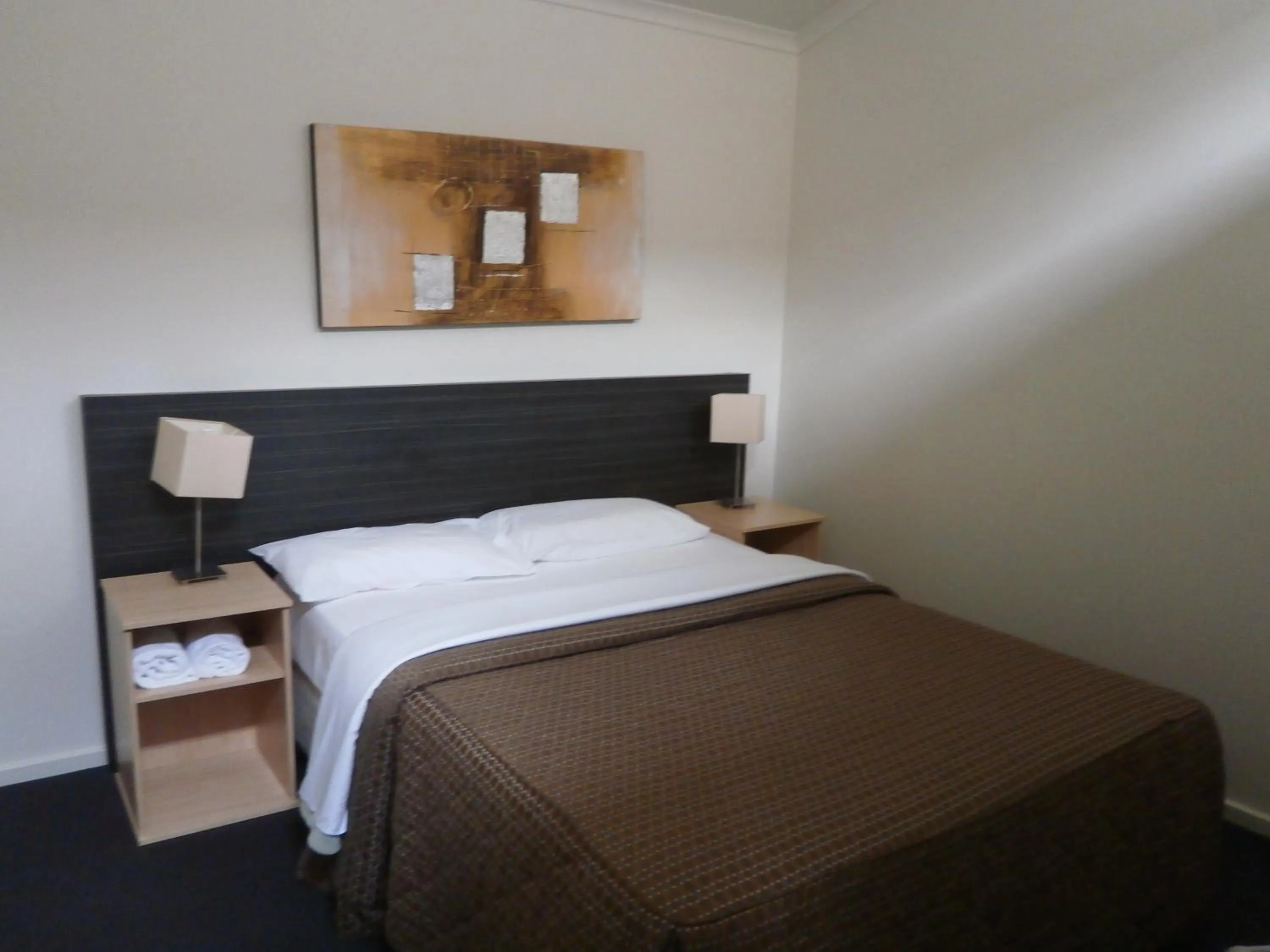 Bed in Sovereign Views Apartments