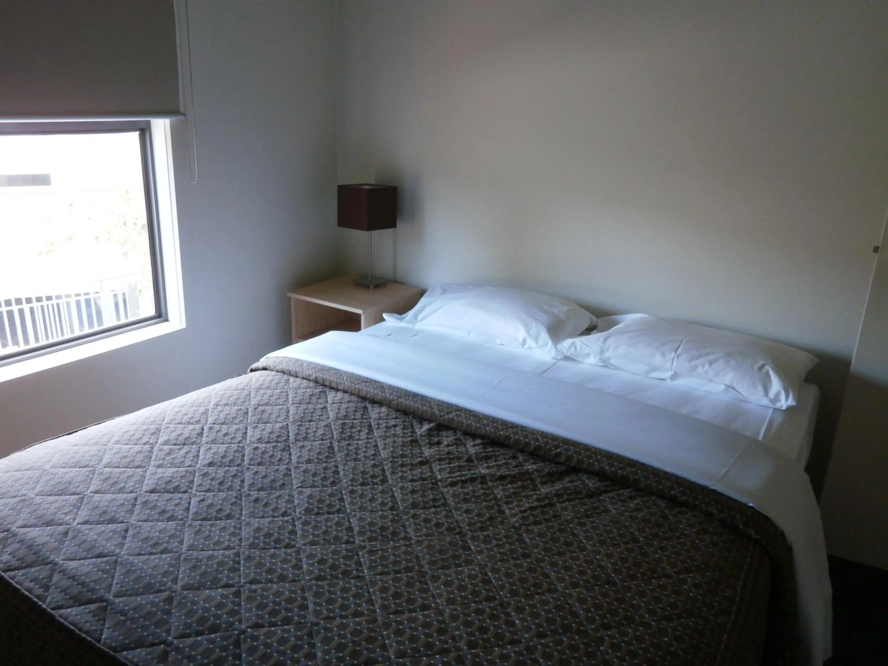 Bed in Sovereign Views Apartments