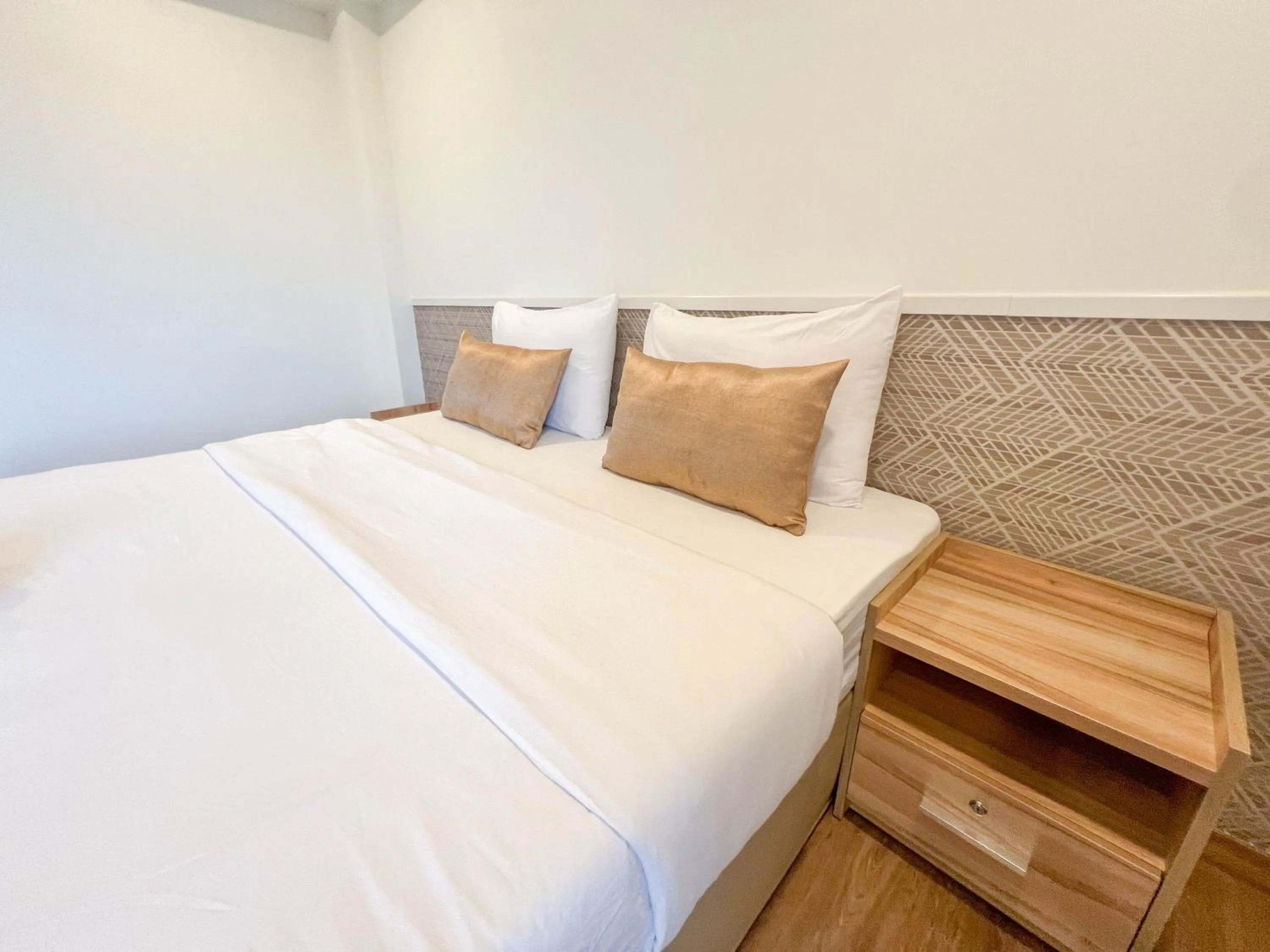 Bed in Inspire House Hotel