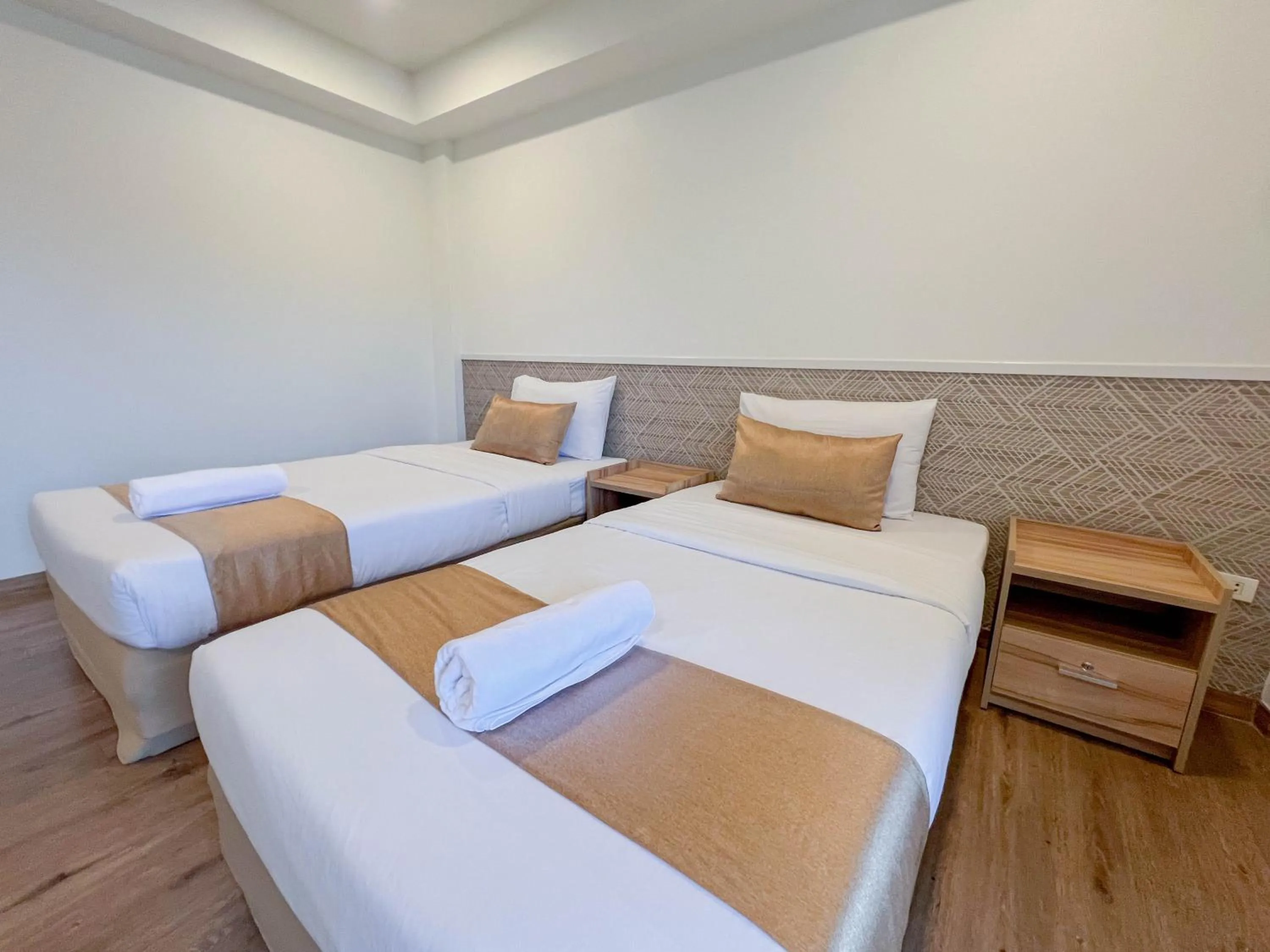 Bed in Inspire House Hotel