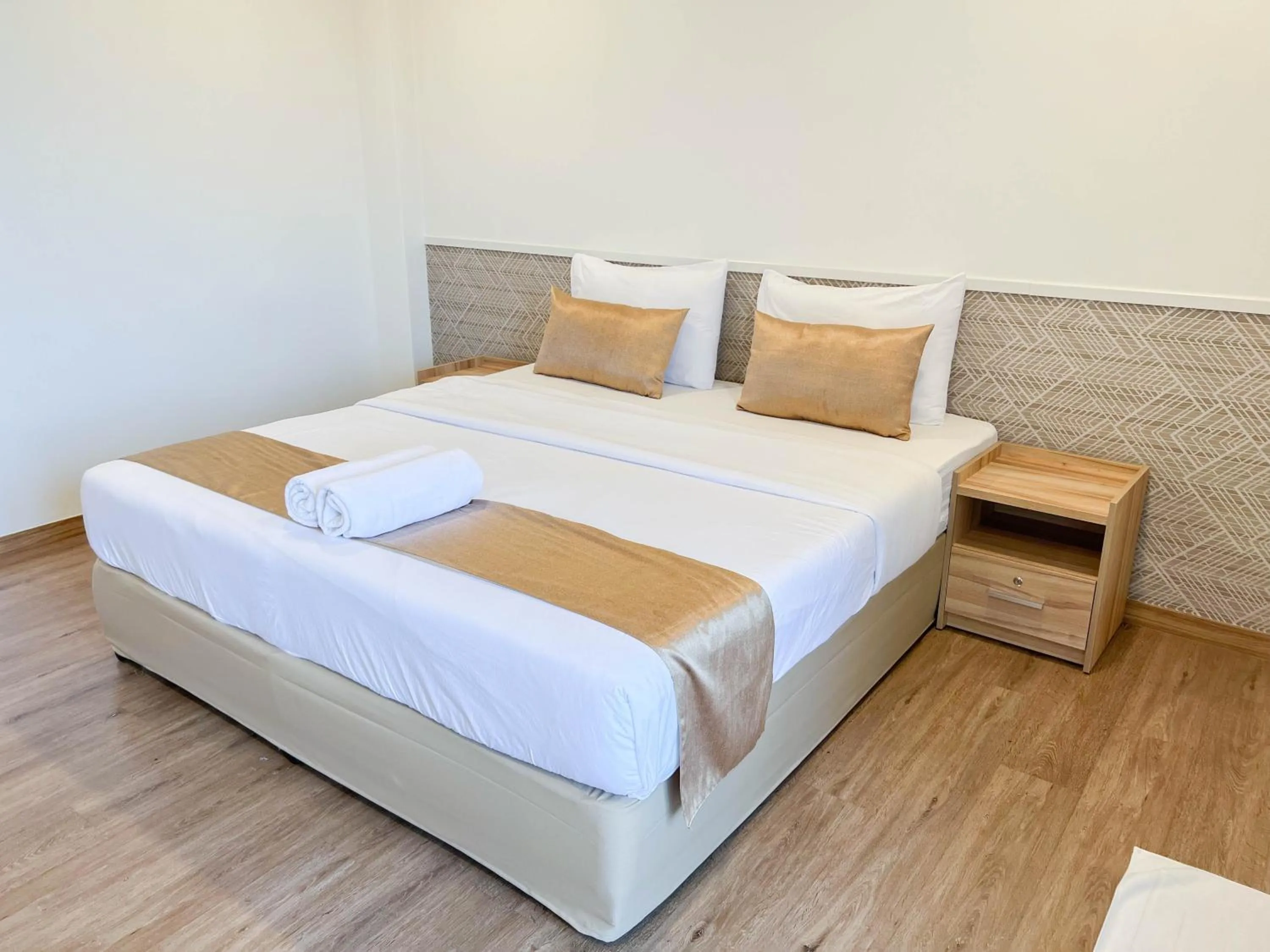 Bed in Inspire House Hotel