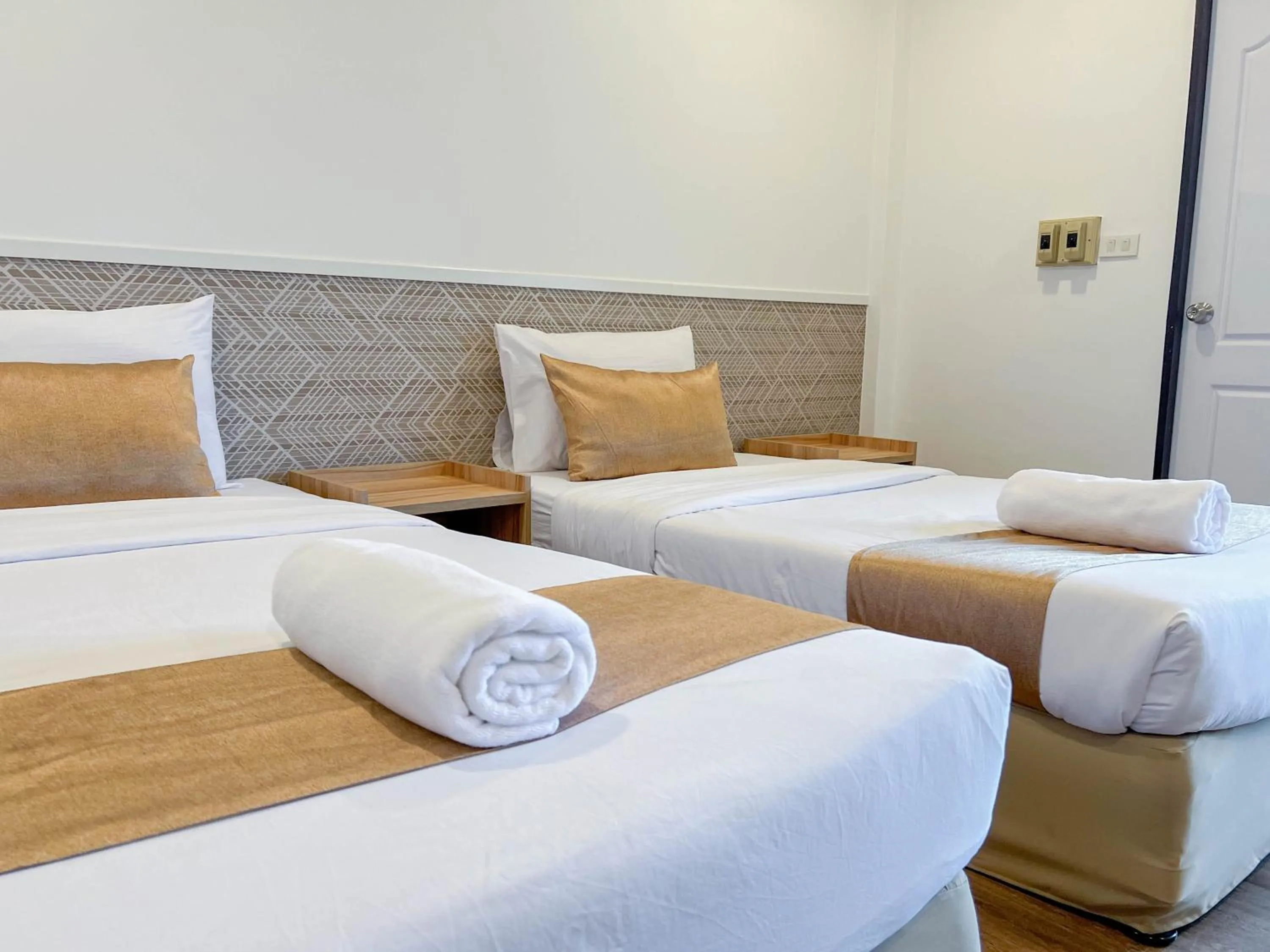 Bed in Inspire House Hotel