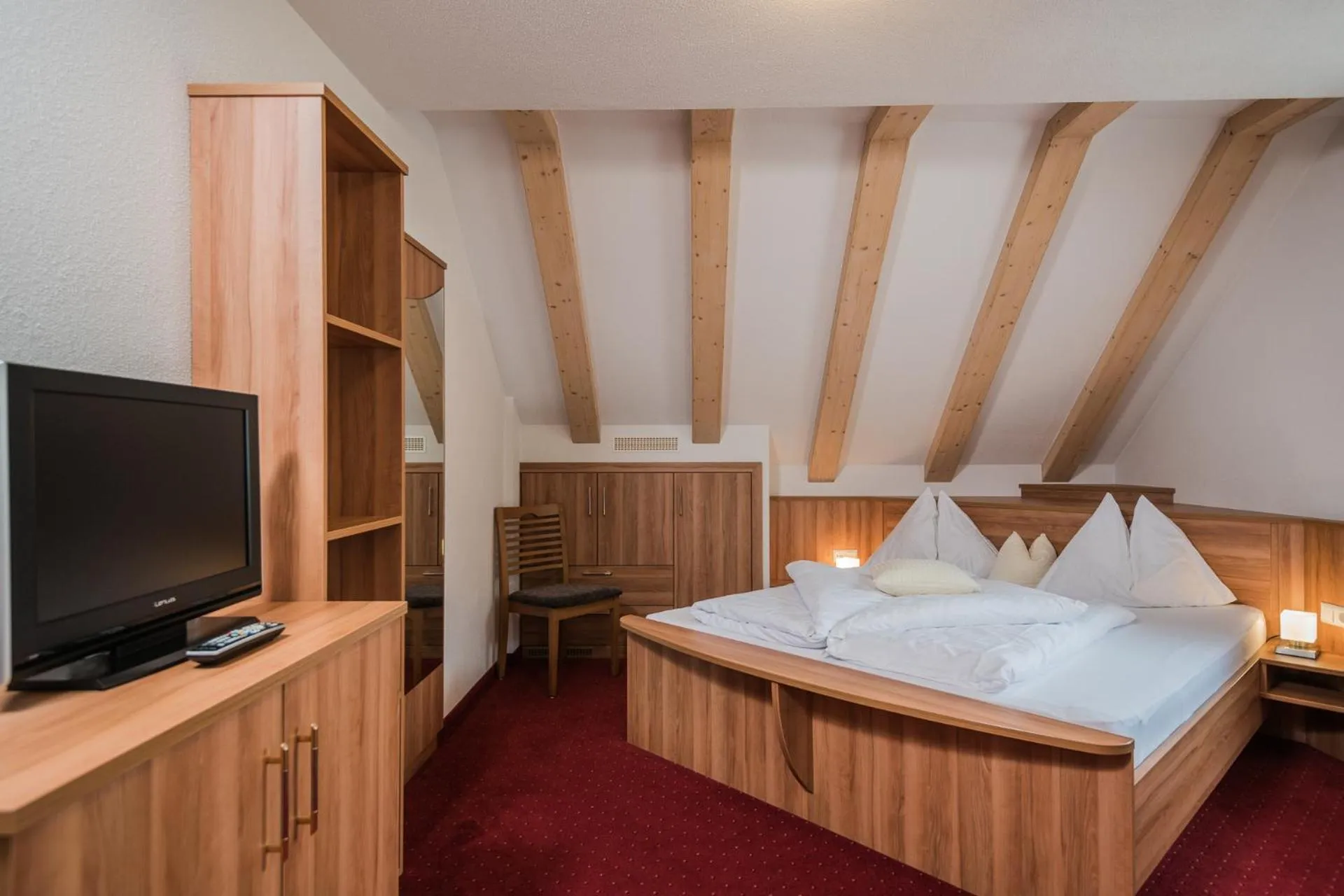 Bedroom in Schmalzlhof Hotel & Apartments