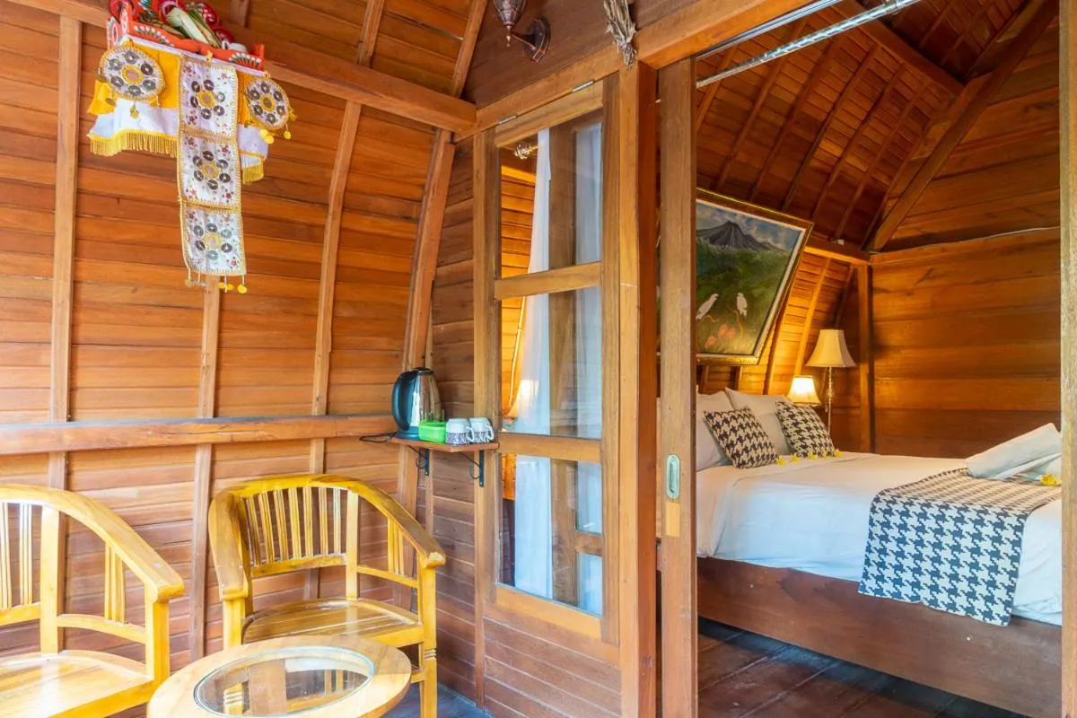 Seating area, Bed in Madeira Inn Villa by Bukit Vista