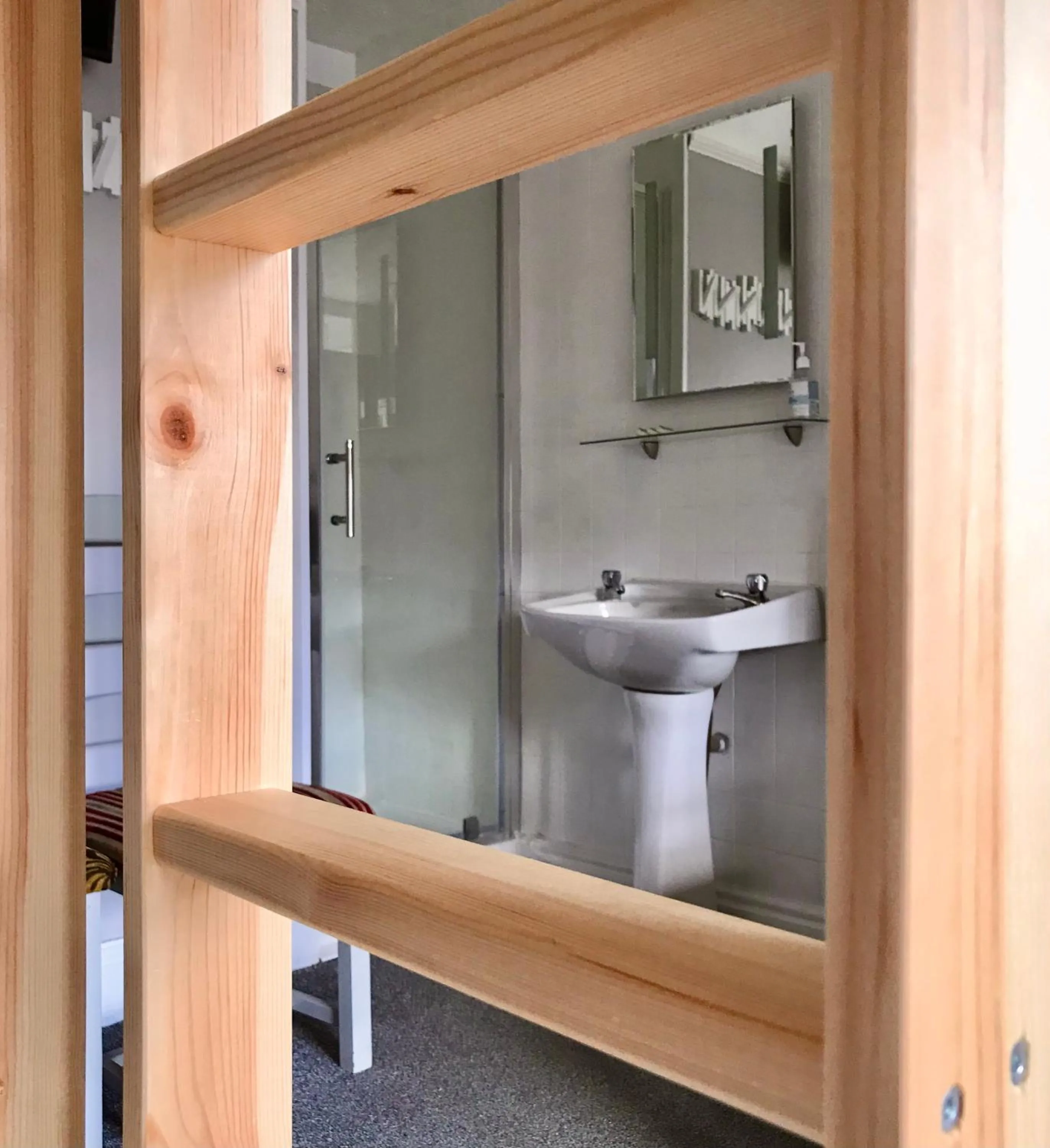 Shower in Breakers Guest House