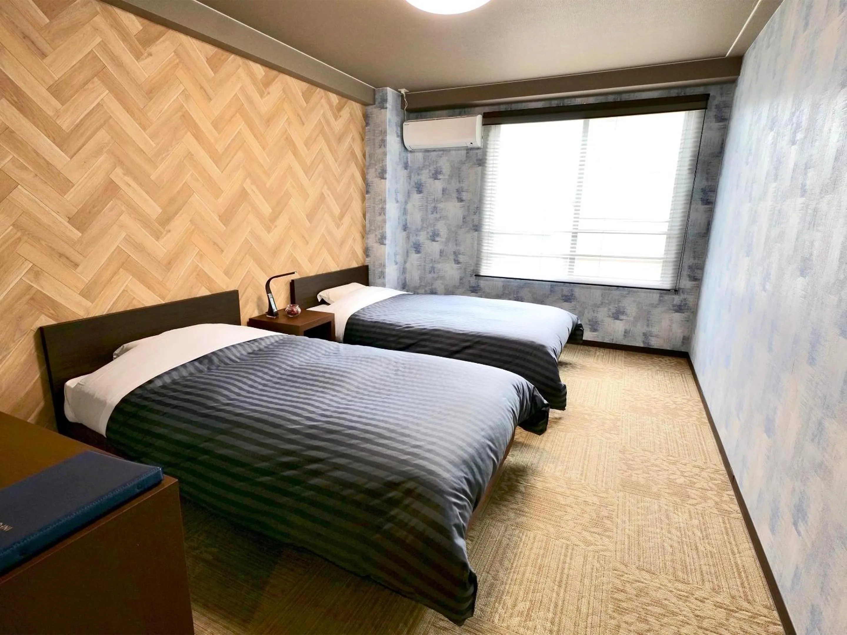 Bed in Apprising hotels GranJam Tsugaike