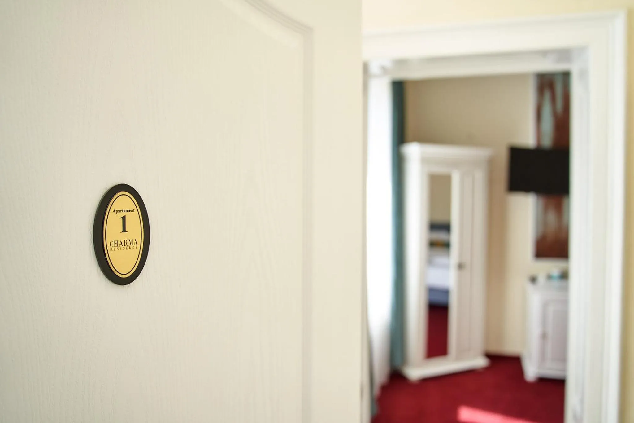 Property logo or sign in Charma Residence