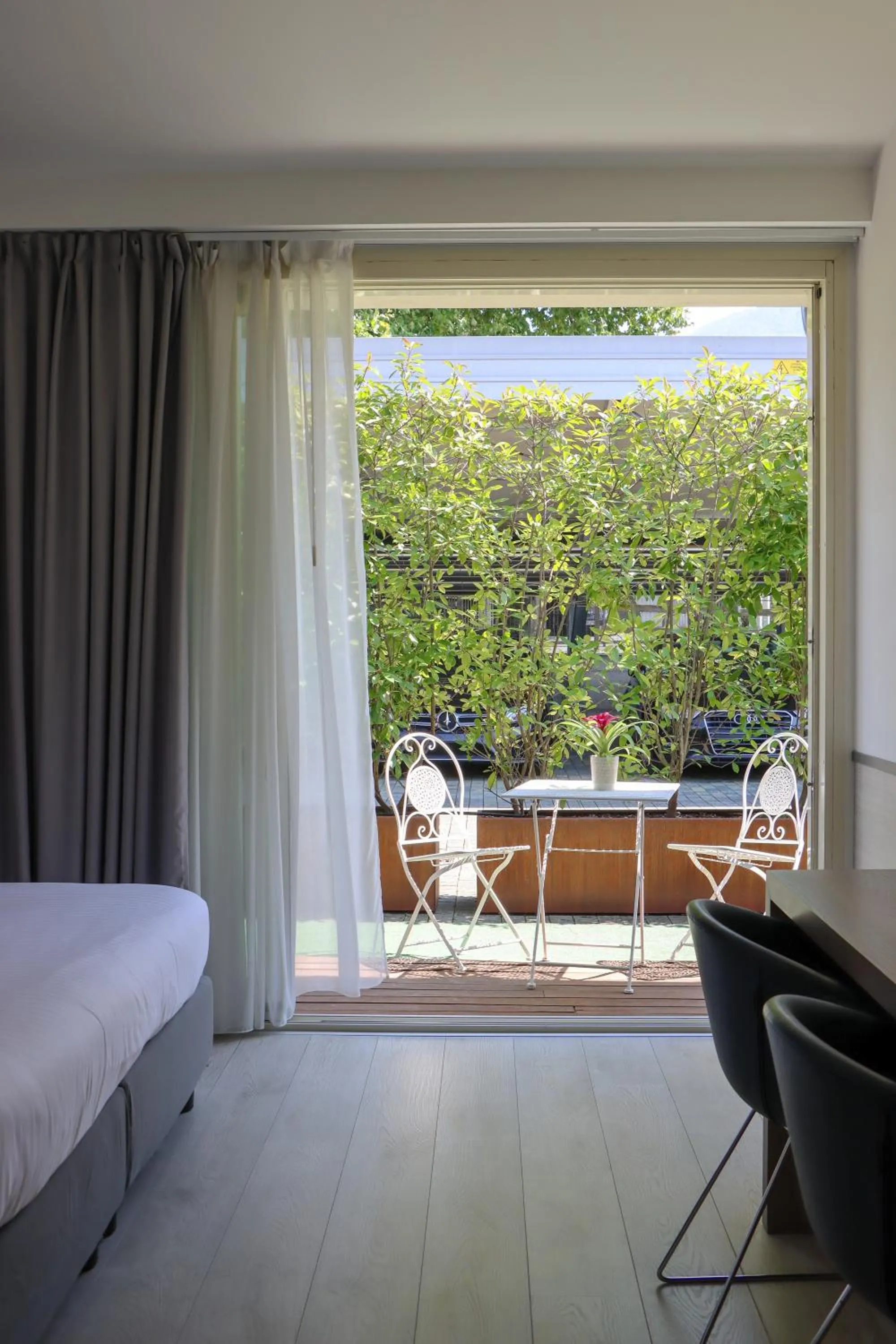 Patio, Bed in Seven Park Hotel Lake Como - Adults Only