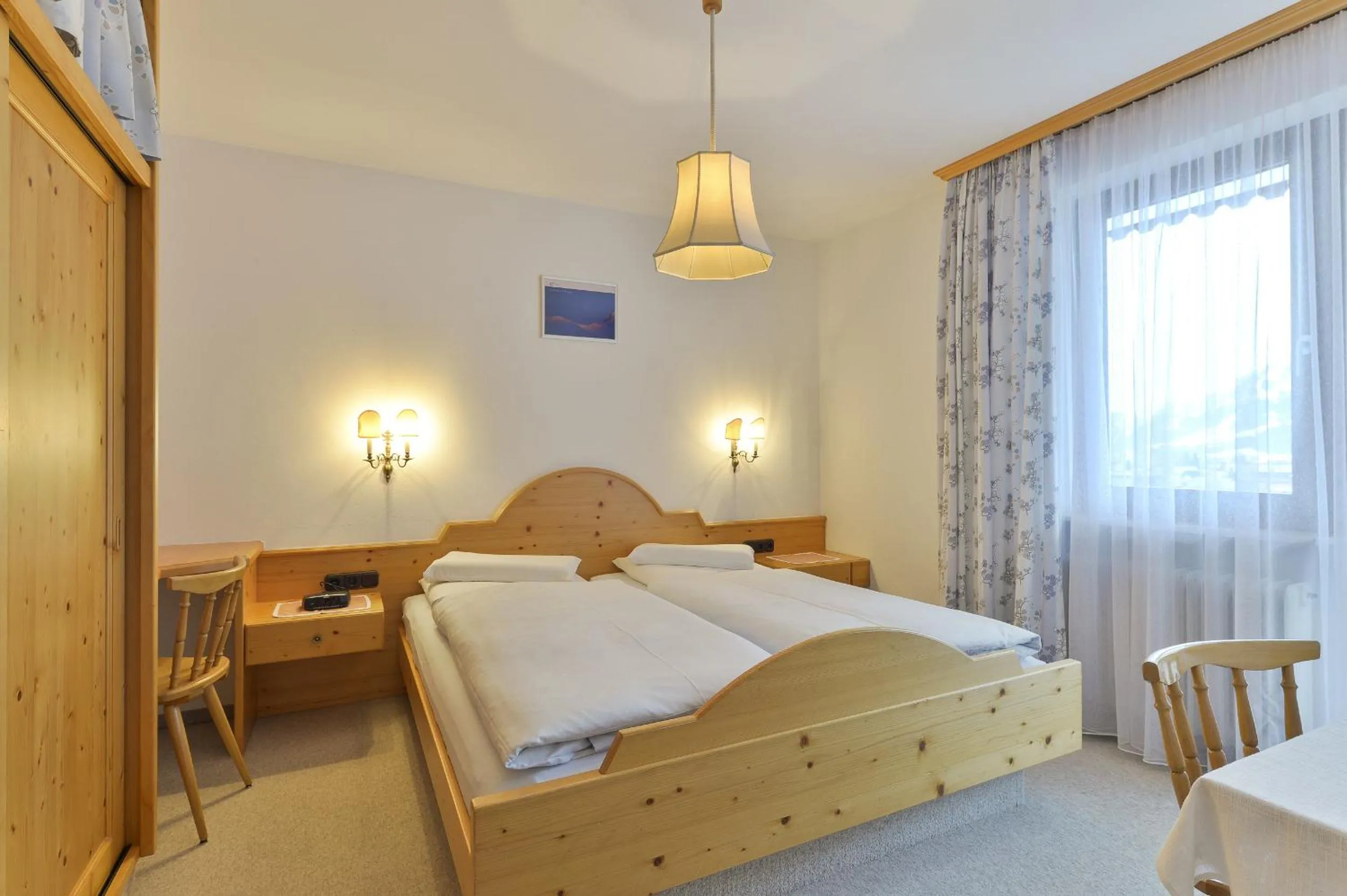 Bed in Hotel Bergheim