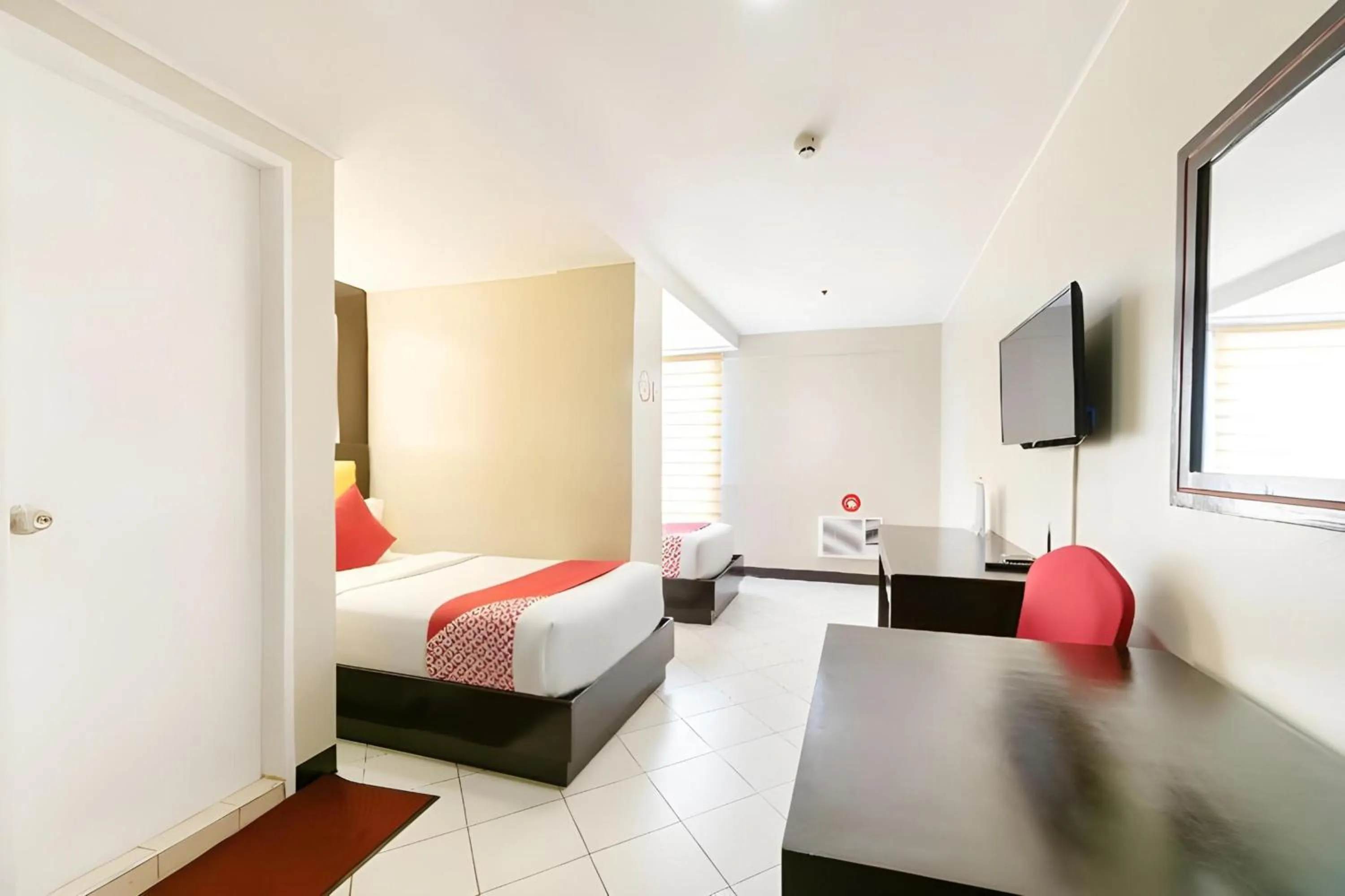 Photo of the whole room in OYO 115 Northridge Mansions