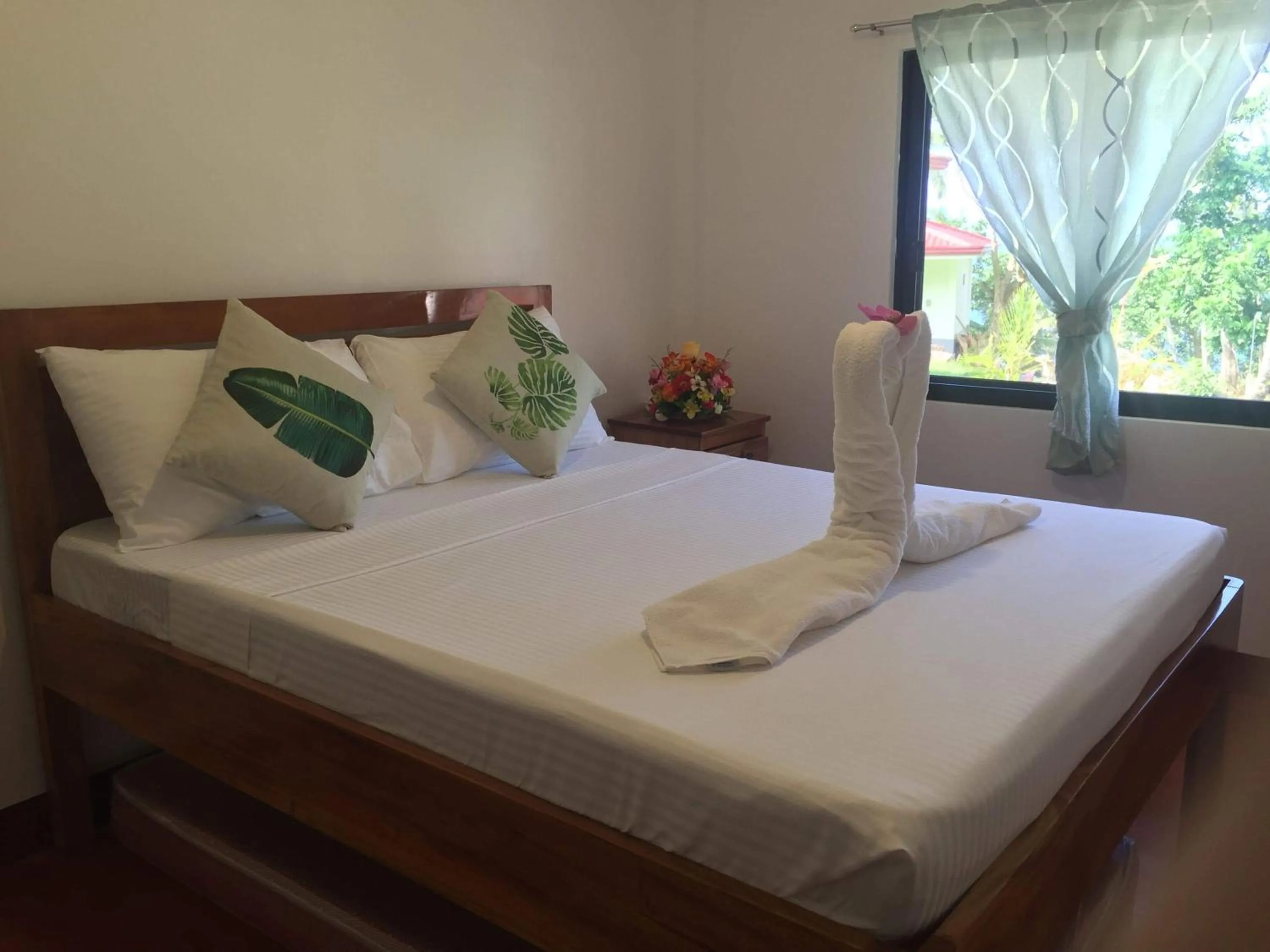 Bed in Tongatok Cliff Resort