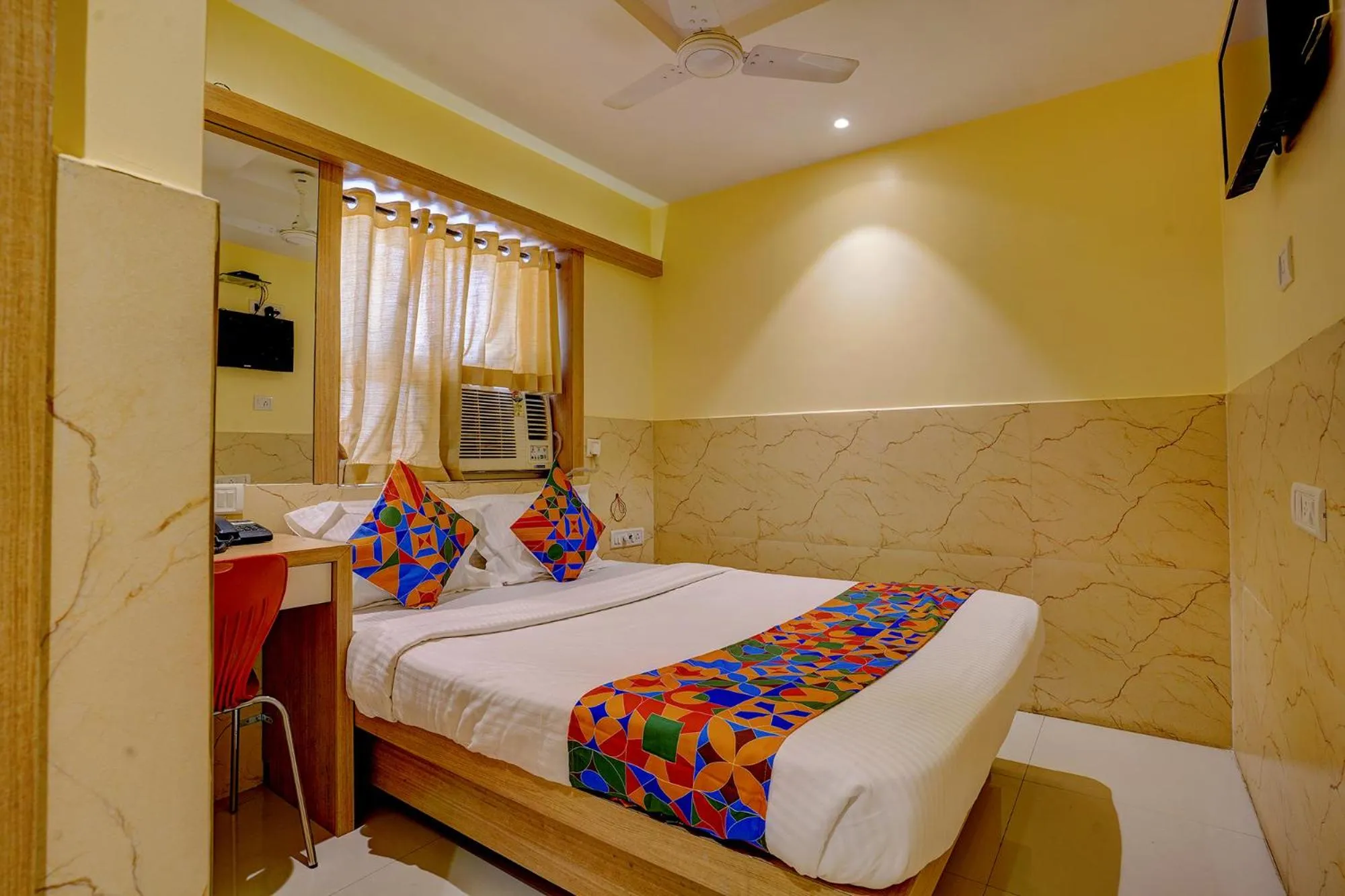 Bed in FabHotel Starwood Residency - 100M From Dr DY Patil Stadium