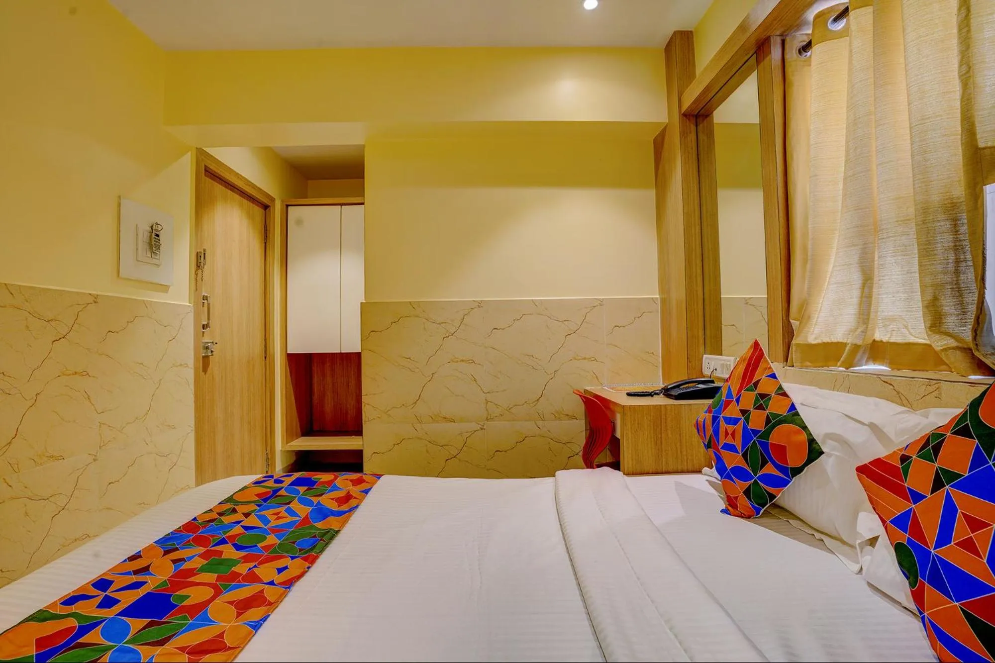 Bed in FabHotel Starwood Residency - 100M From Dr DY Patil Stadium