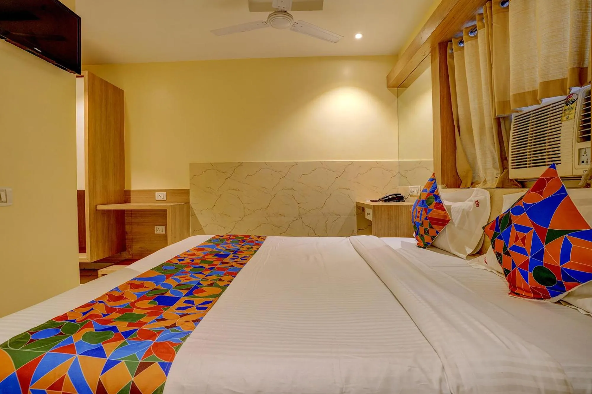 Bed in FabHotel Starwood Residency - 100M From Dr DY Patil Stadium