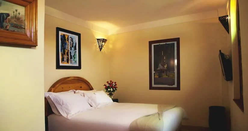 Bed in Riad Granvilier