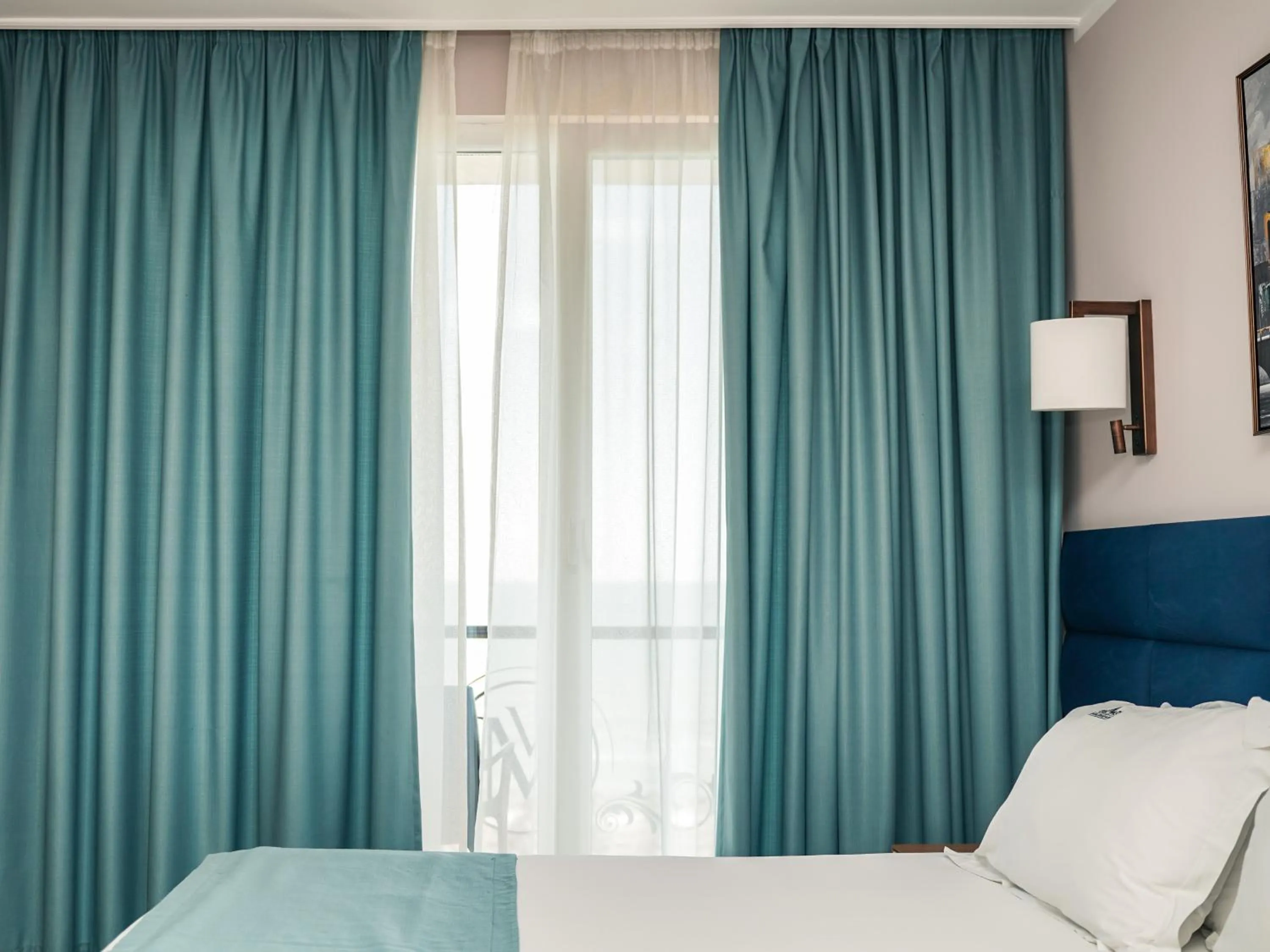 Bed in VM Resort & SPA