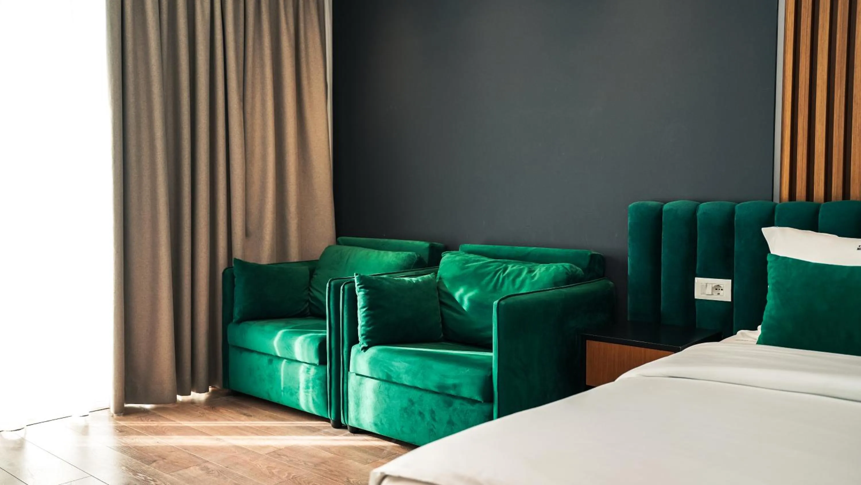 Seating area, Bed in VM Resort & SPA