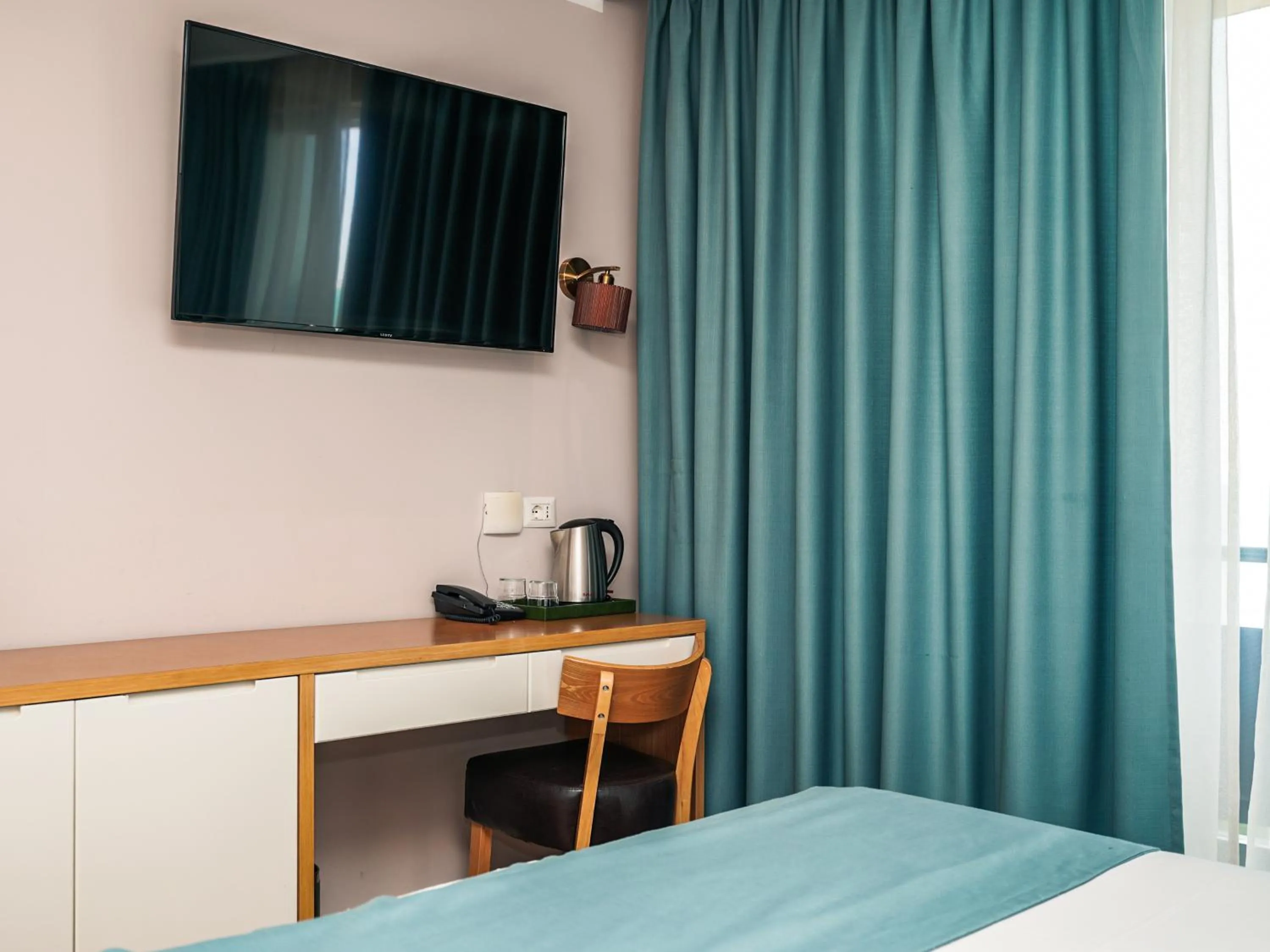 Bed in VM Resort & SPA