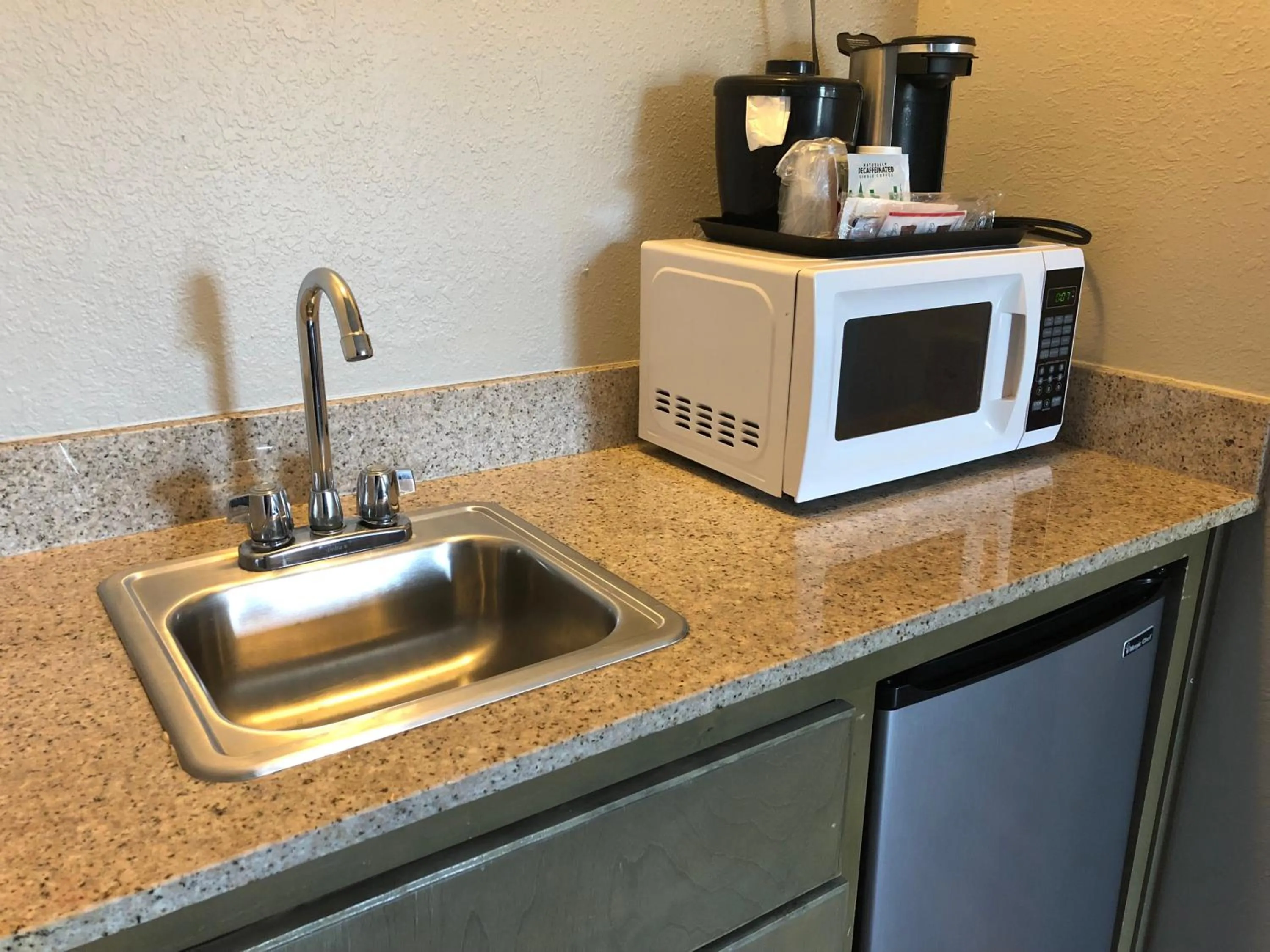 Kitchen or kitchenette in La Quinta by Wyndham PCB Coastal Palms