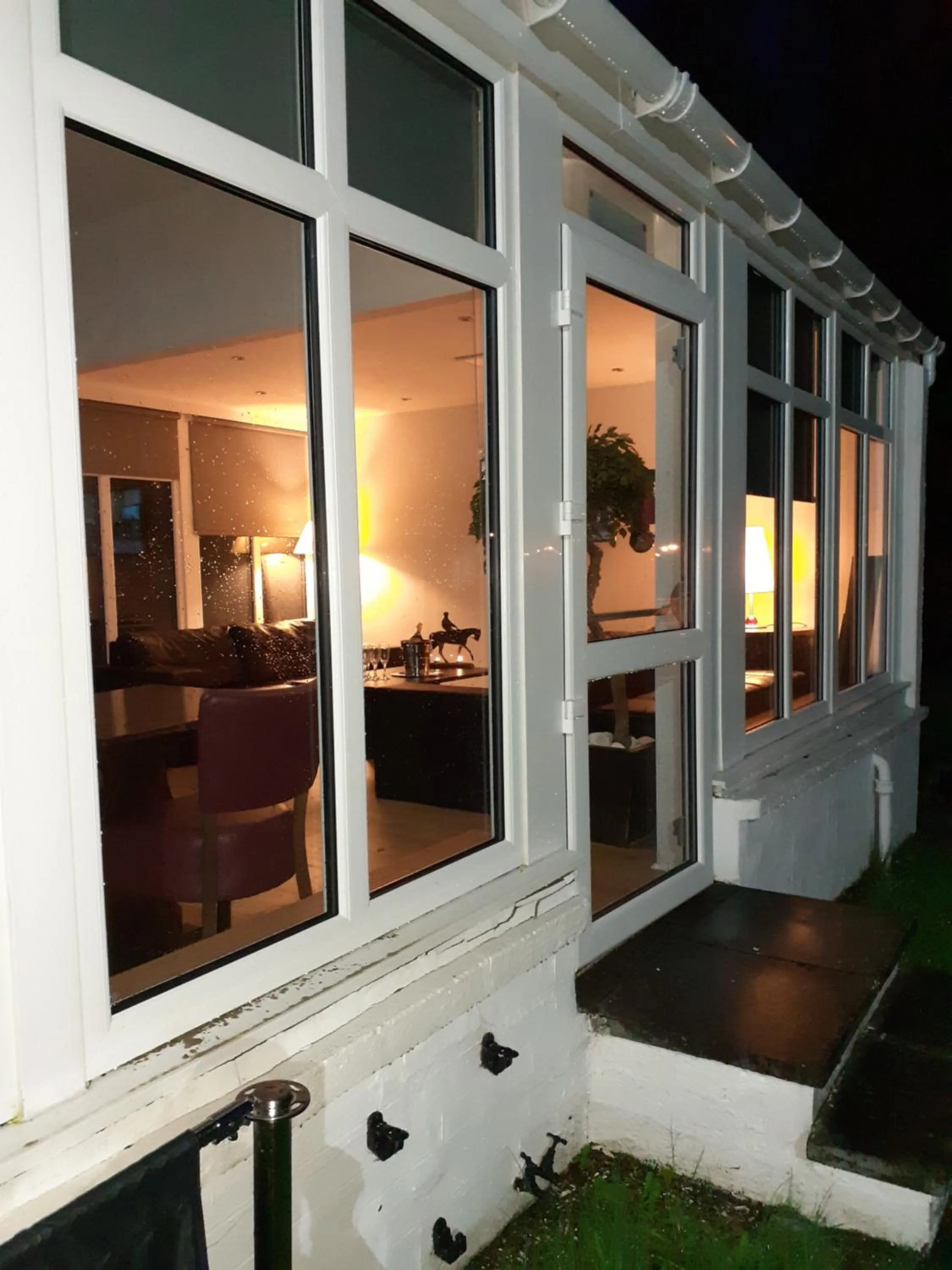 Communal lounge/ TV room in The Speyside Hotel and Restaurant