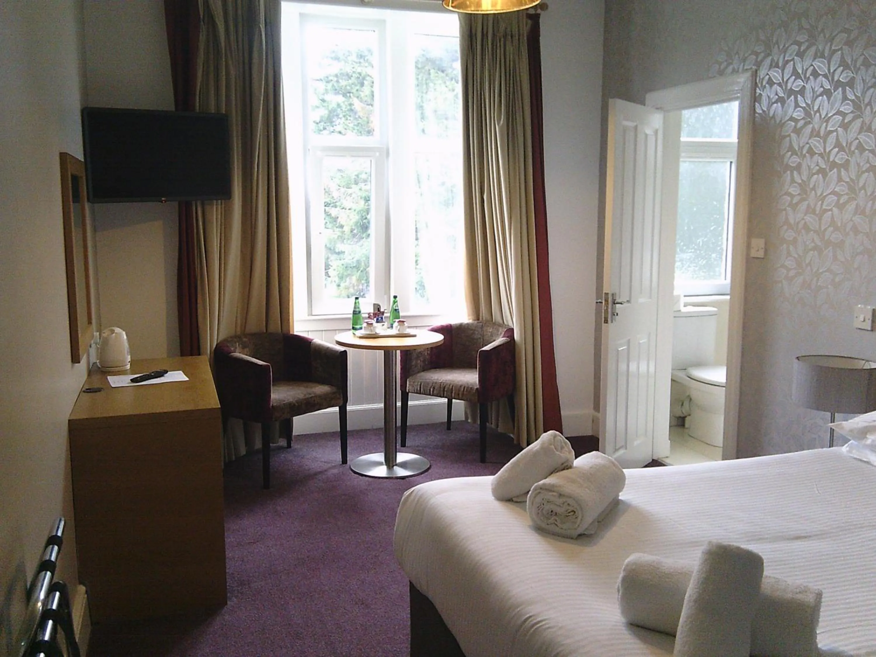 Bed in The Speyside Hotel and Restaurant