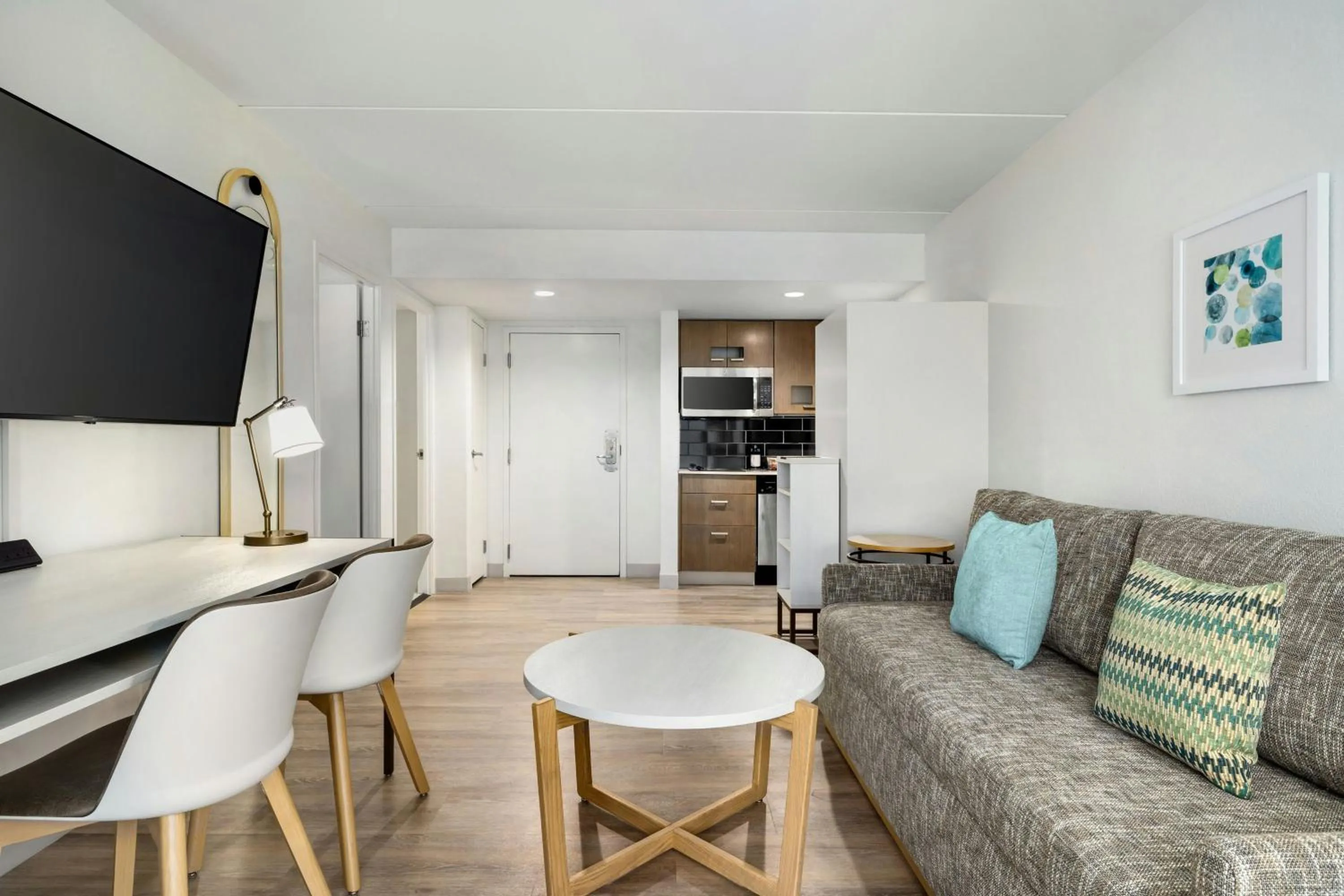 Living room in TownePlace Suites by Marriott Charlotte LoSo Airport