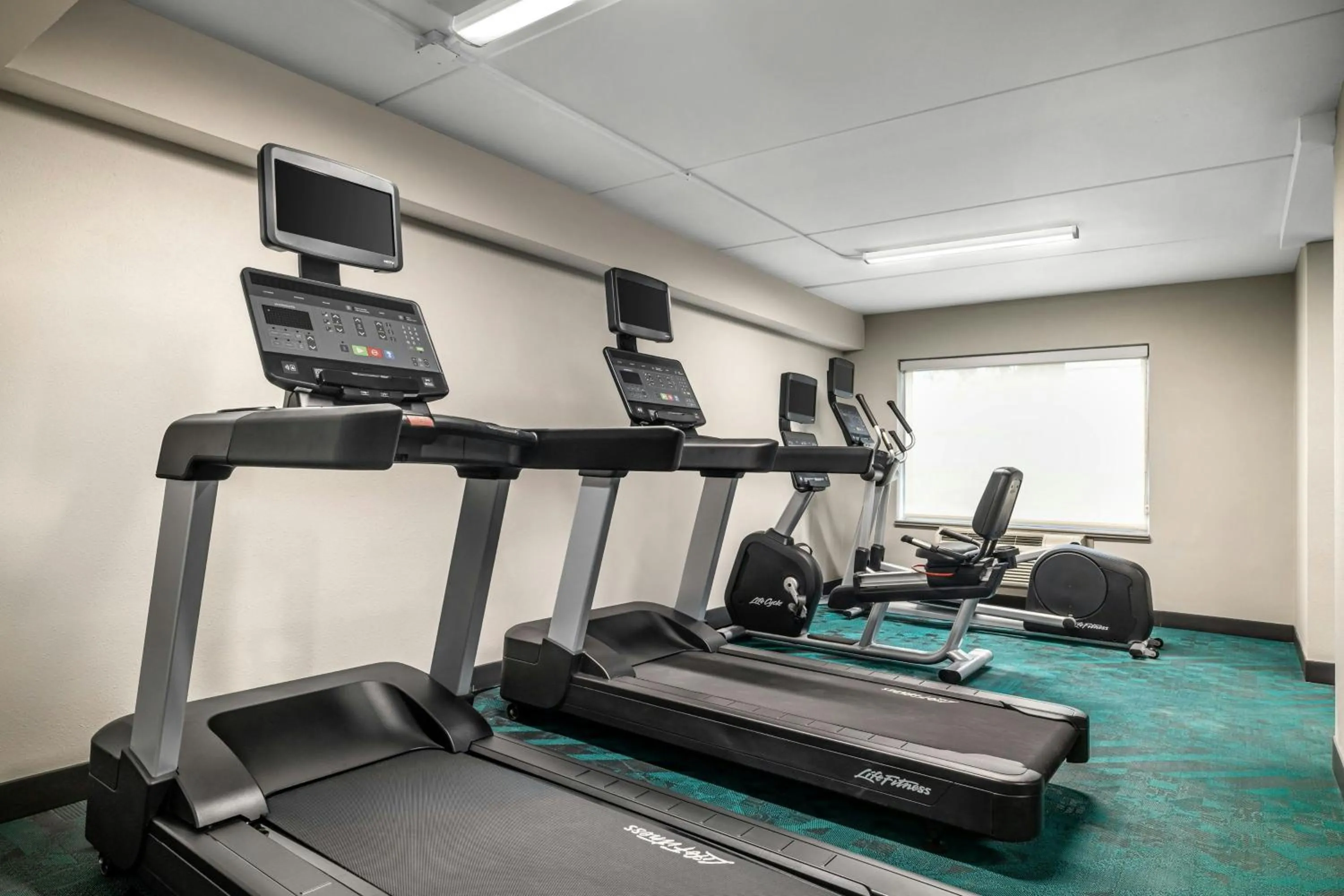 Fitness centre/facilities in TownePlace Suites by Marriott Charlotte LoSo Airport