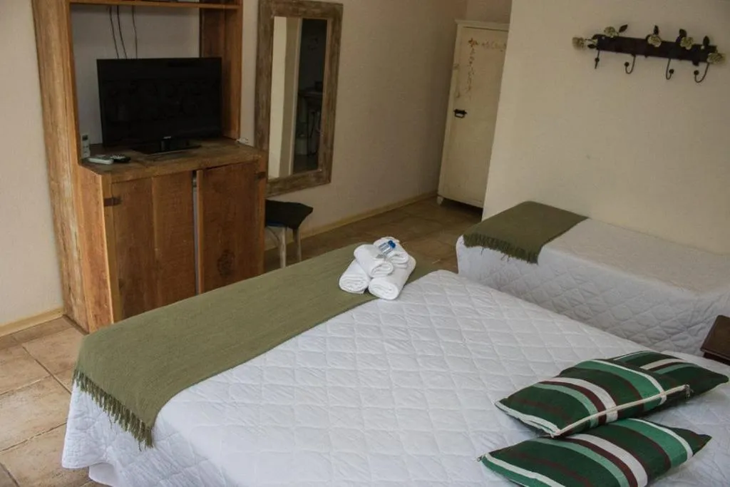 Bed in Pousada Hospedaria da Villa