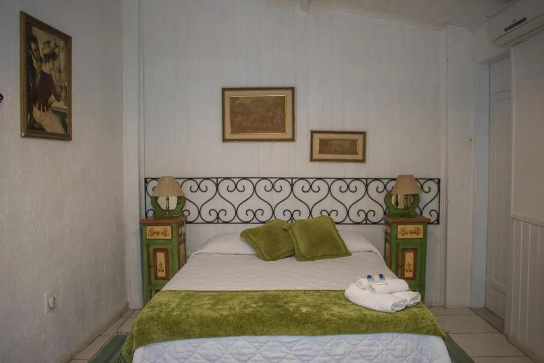 Bed in Pousada Hospedaria da Villa