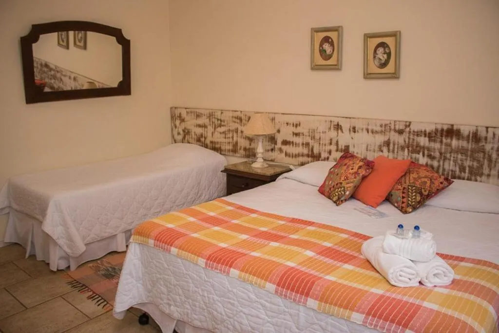 Bed in Pousada Hospedaria da Villa