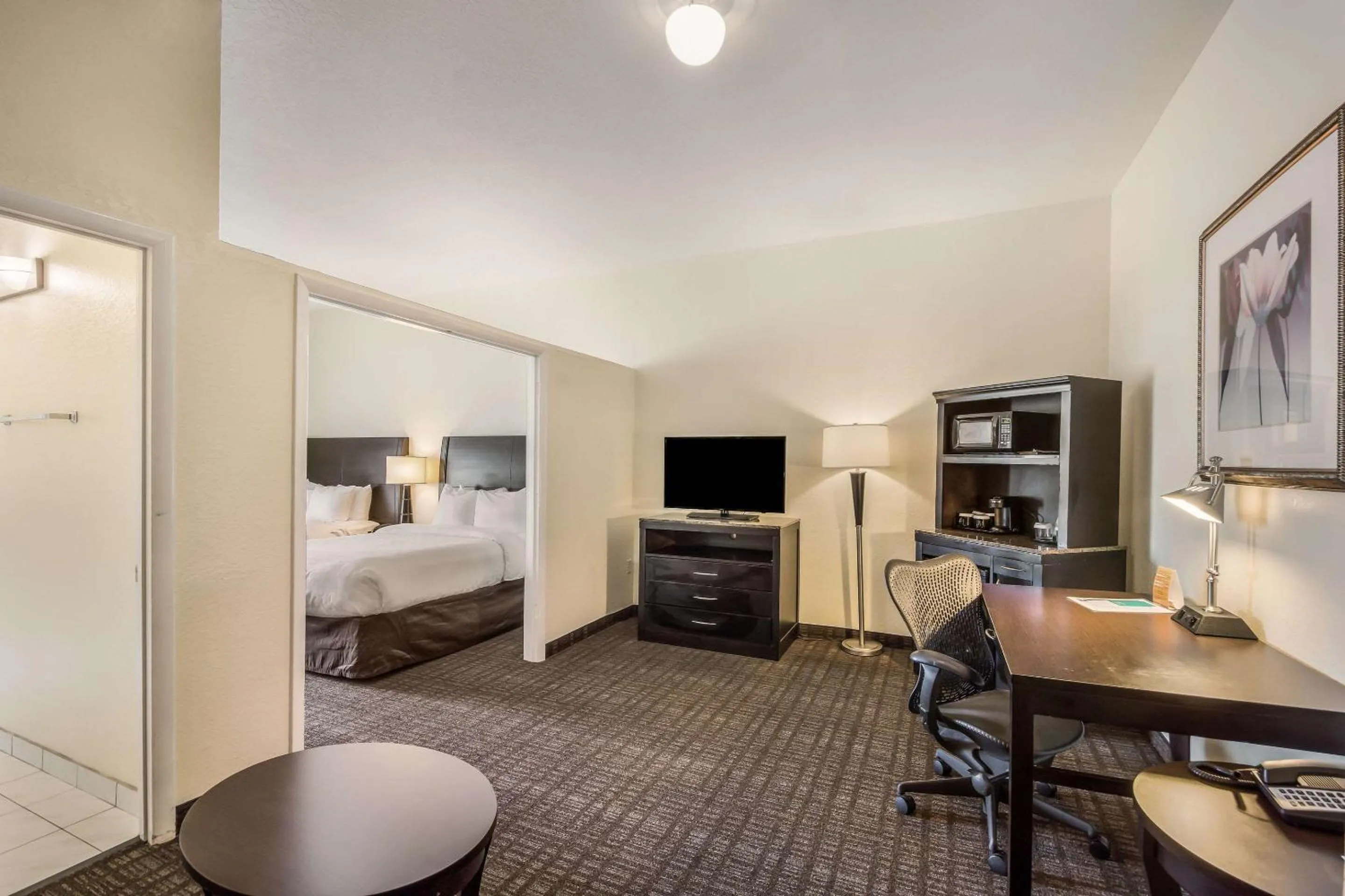 Photo of the whole room, Bed in Clarion Inn & Suites Central Clearwater Beach