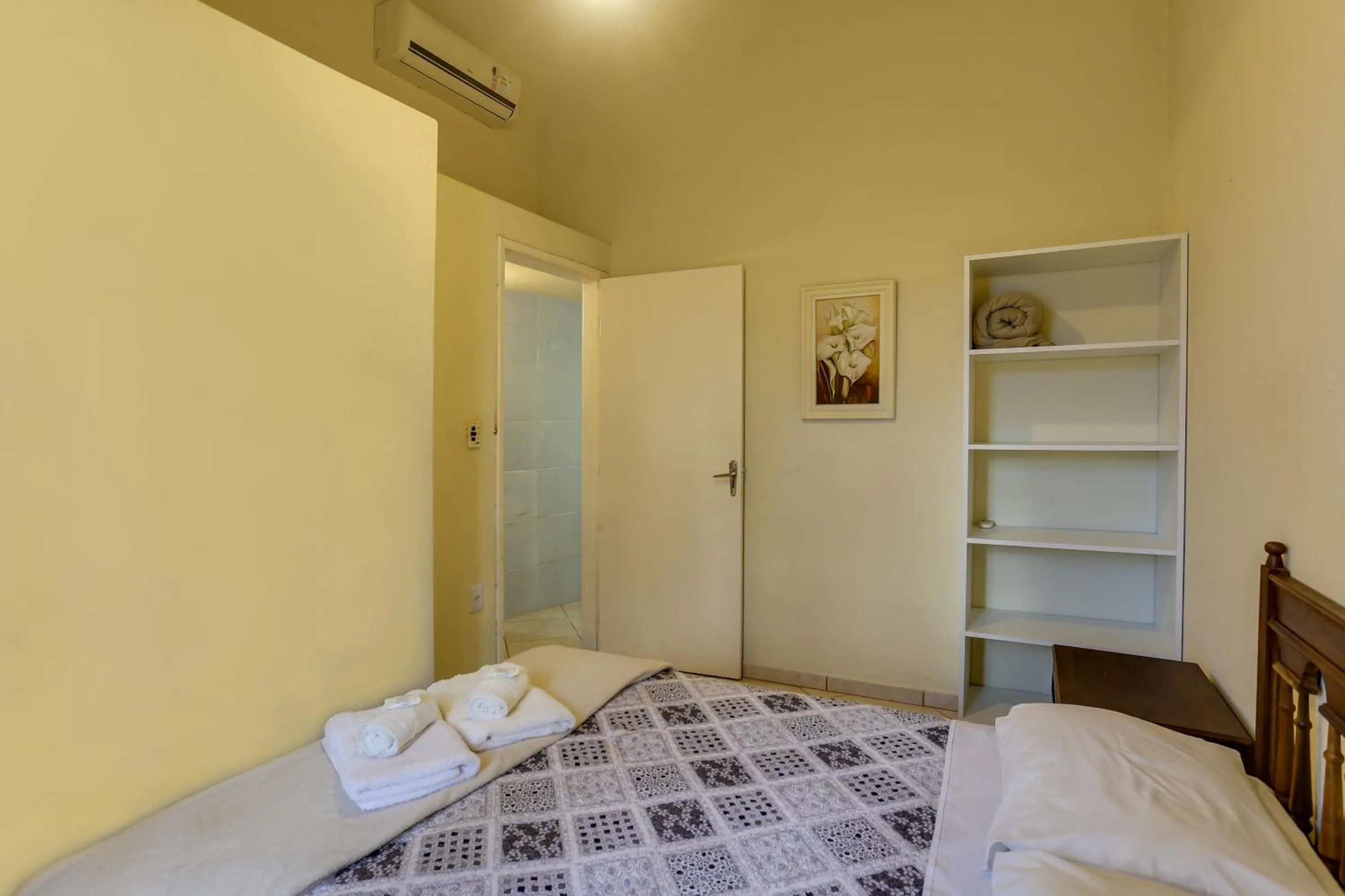 Bed in Pousada Carolina