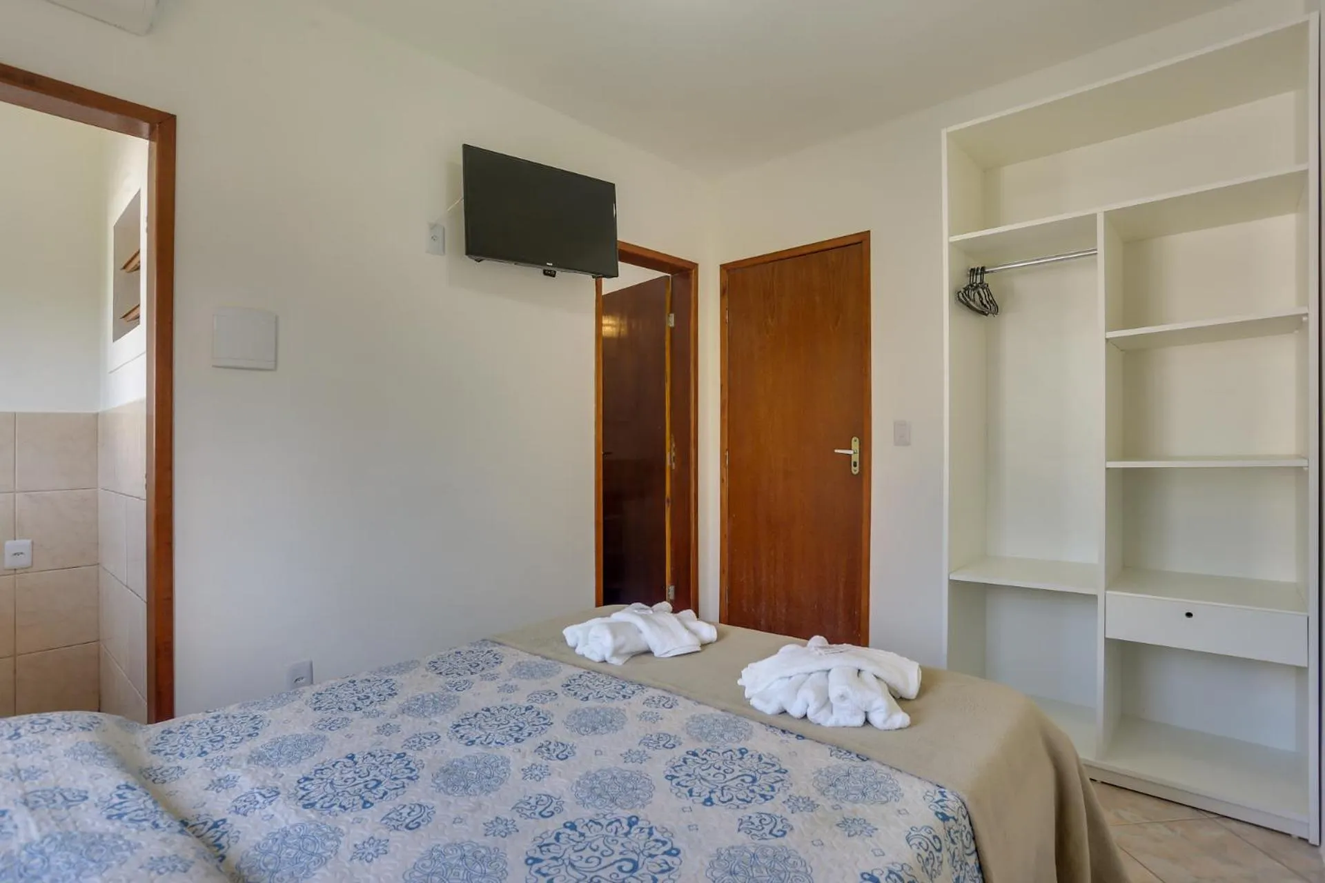 Bed in Pousada Carolina