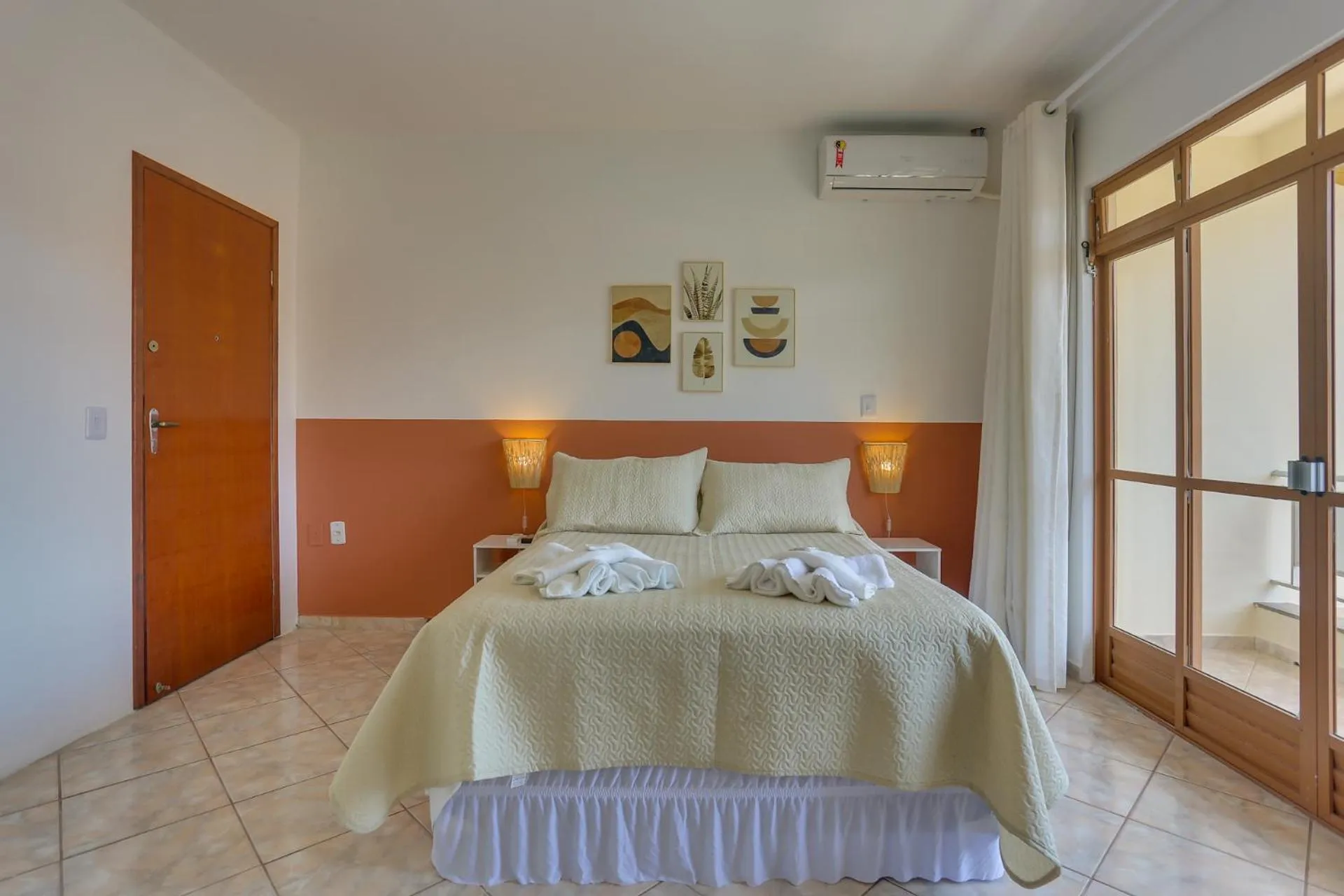 Bed in Pousada Carolina