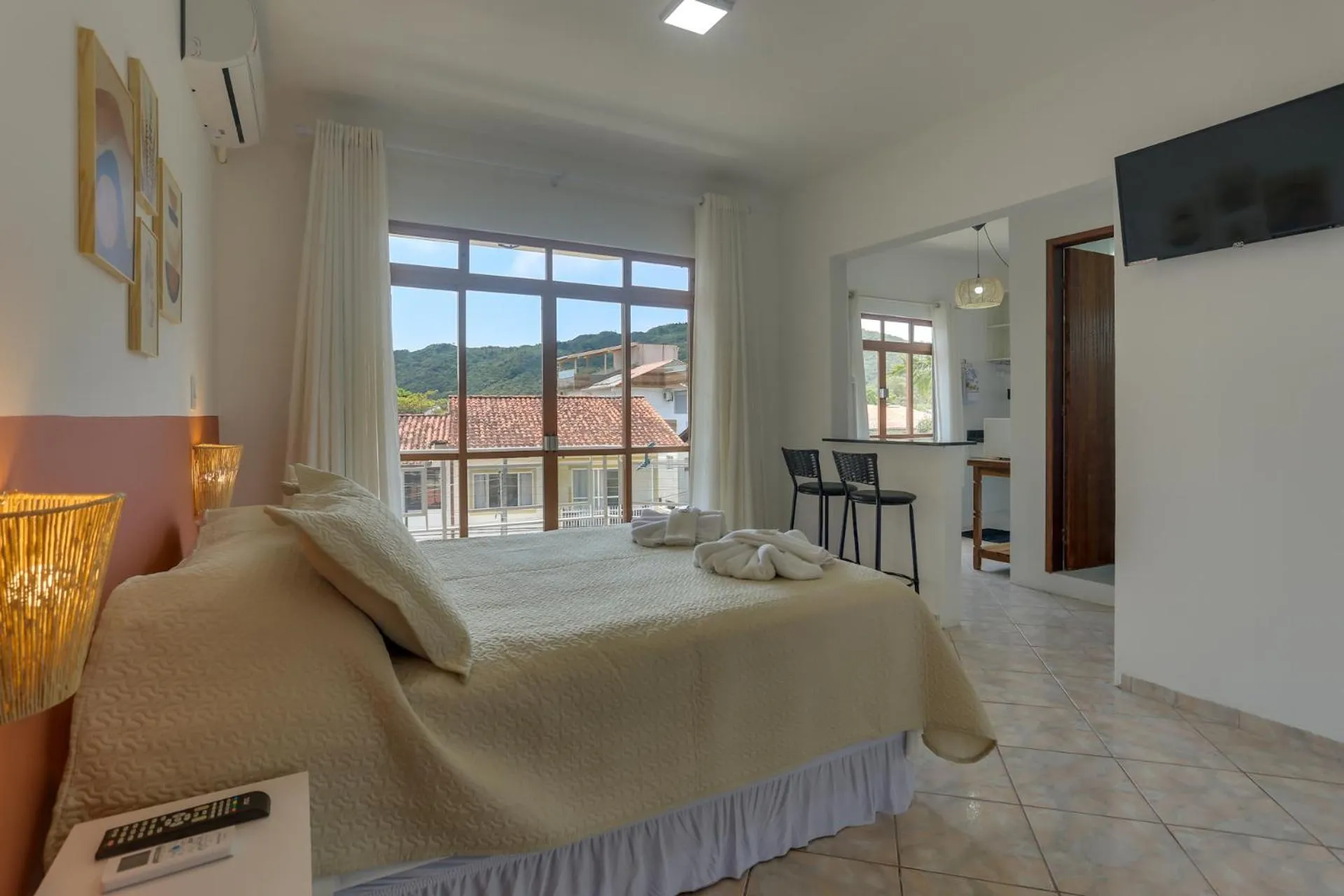 Bed in Pousada Carolina