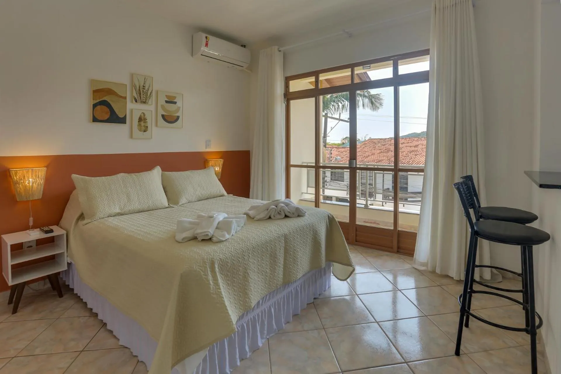 Bed in Pousada Carolina