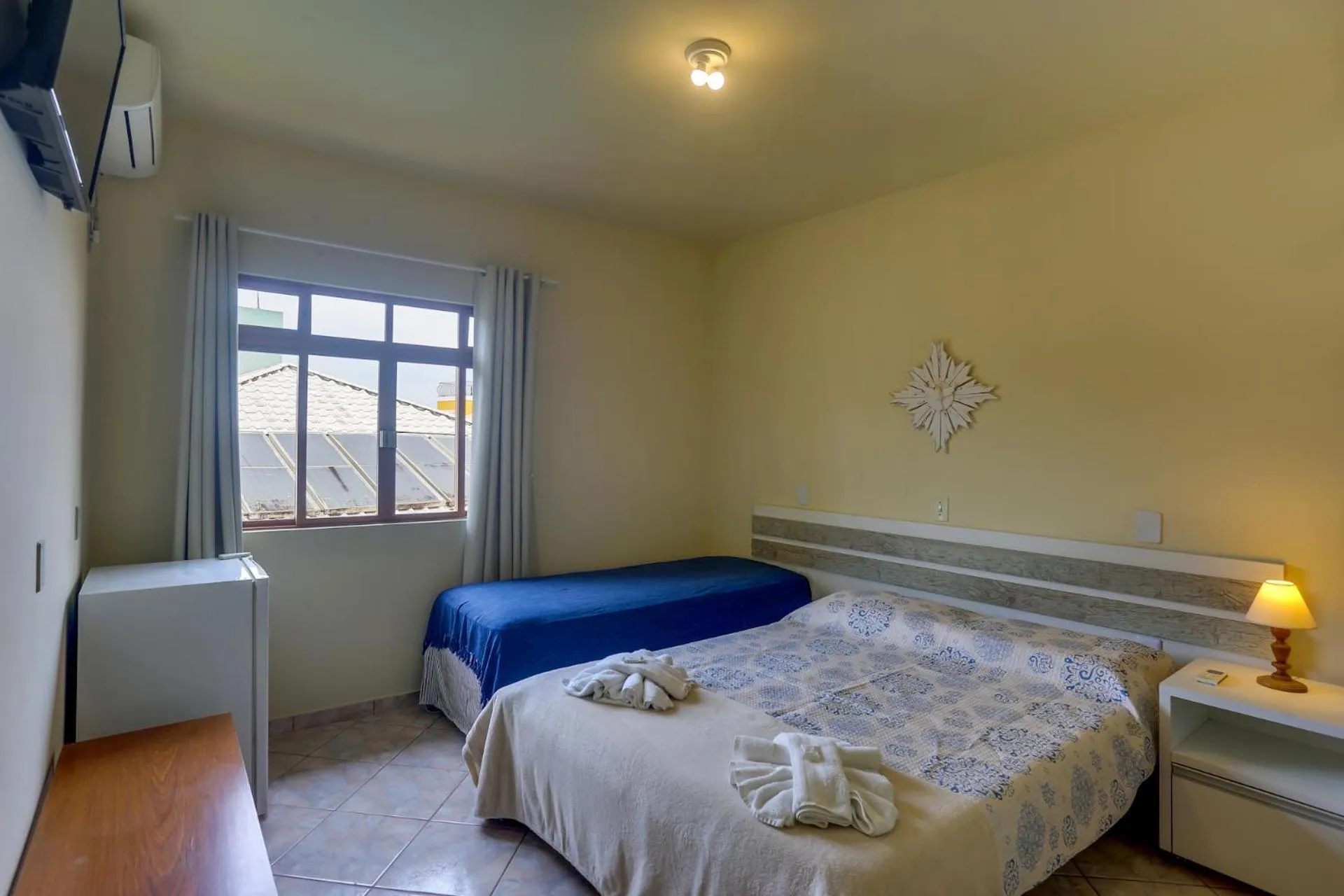 Bed in Pousada Carolina