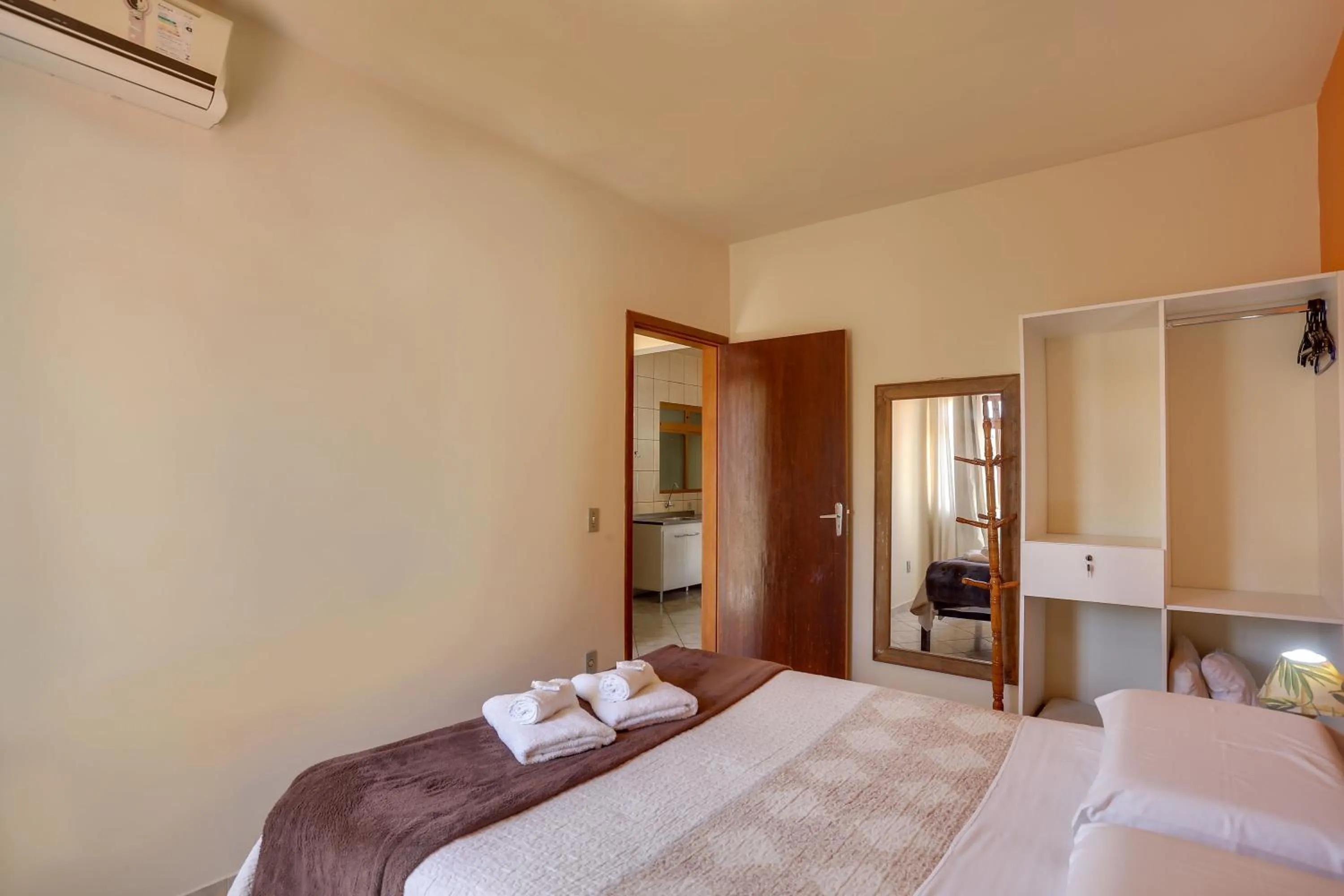 Bed in Pousada Carolina