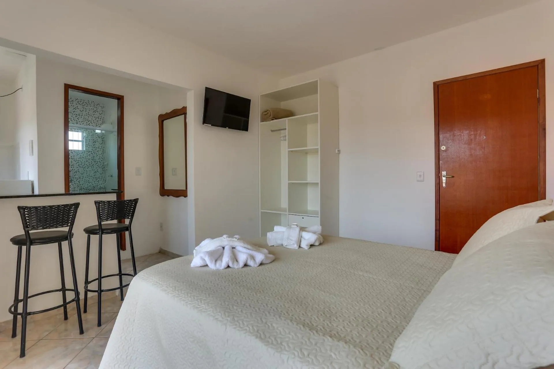 Bed in Pousada Carolina