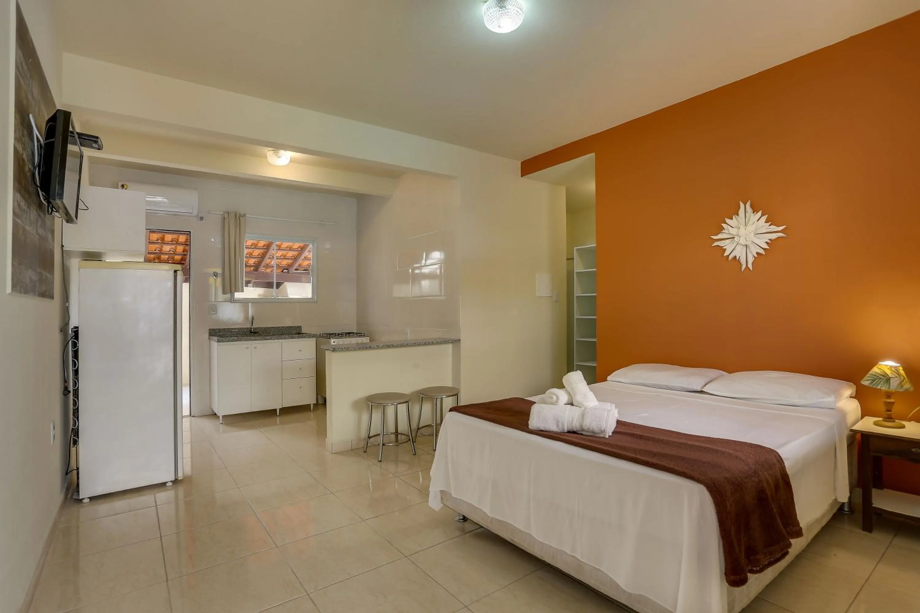 Bed in Pousada Carolina