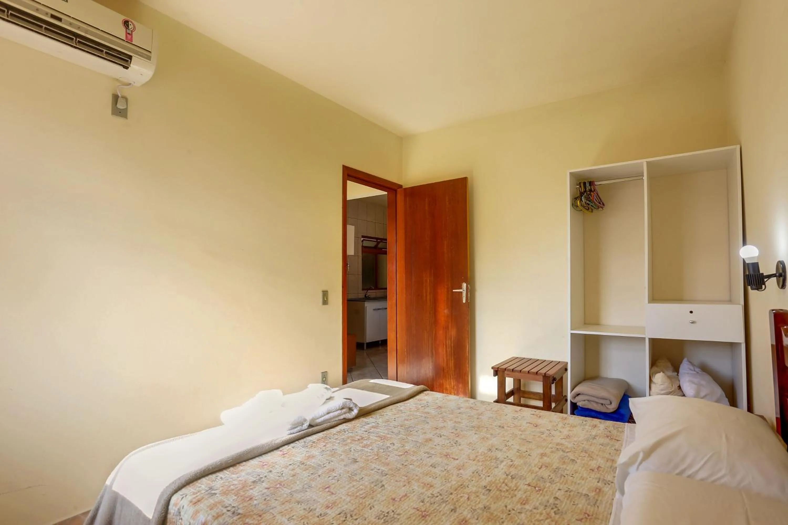 Bed in Pousada Carolina